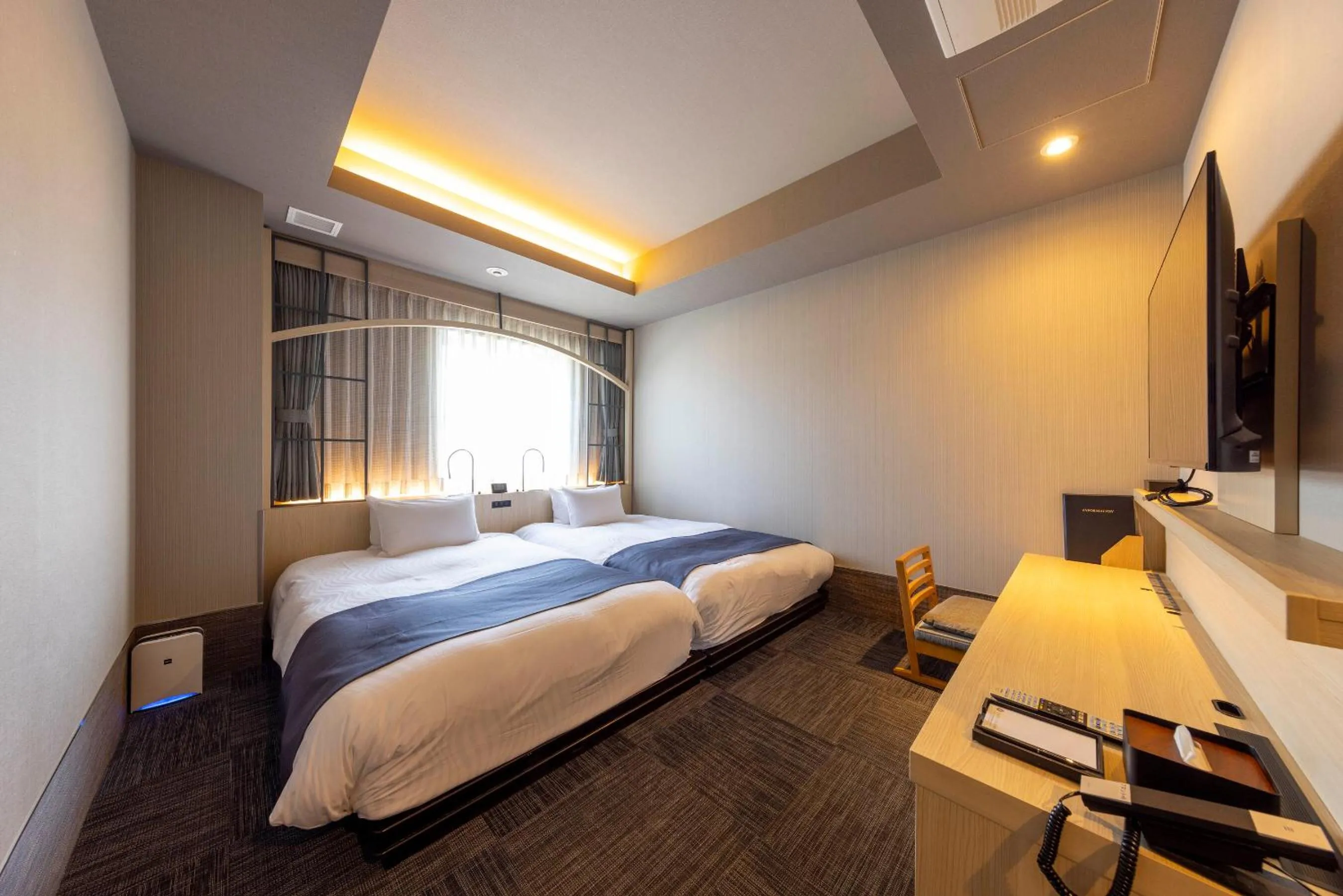 Bed in Hotel Granbinario Tsuruga