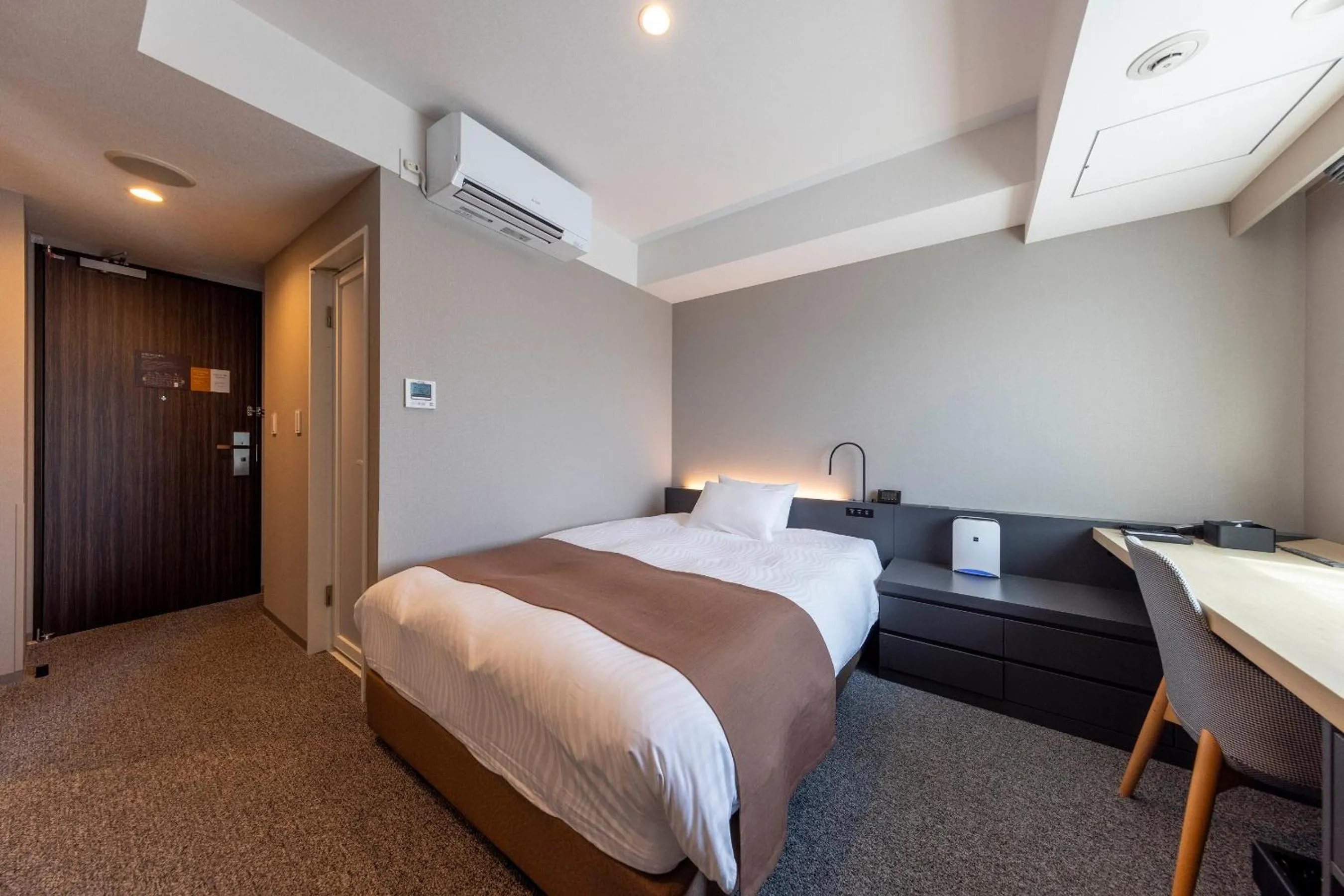 Bed in Hotel Granbinario Tsuruga