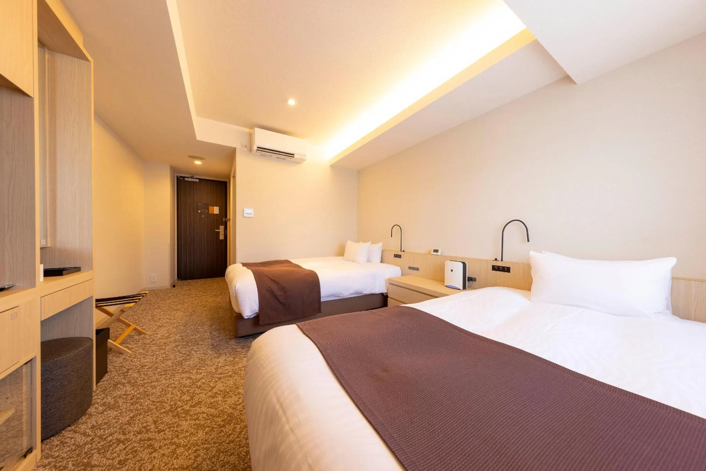 Bed in Hotel Granbinario Tsuruga