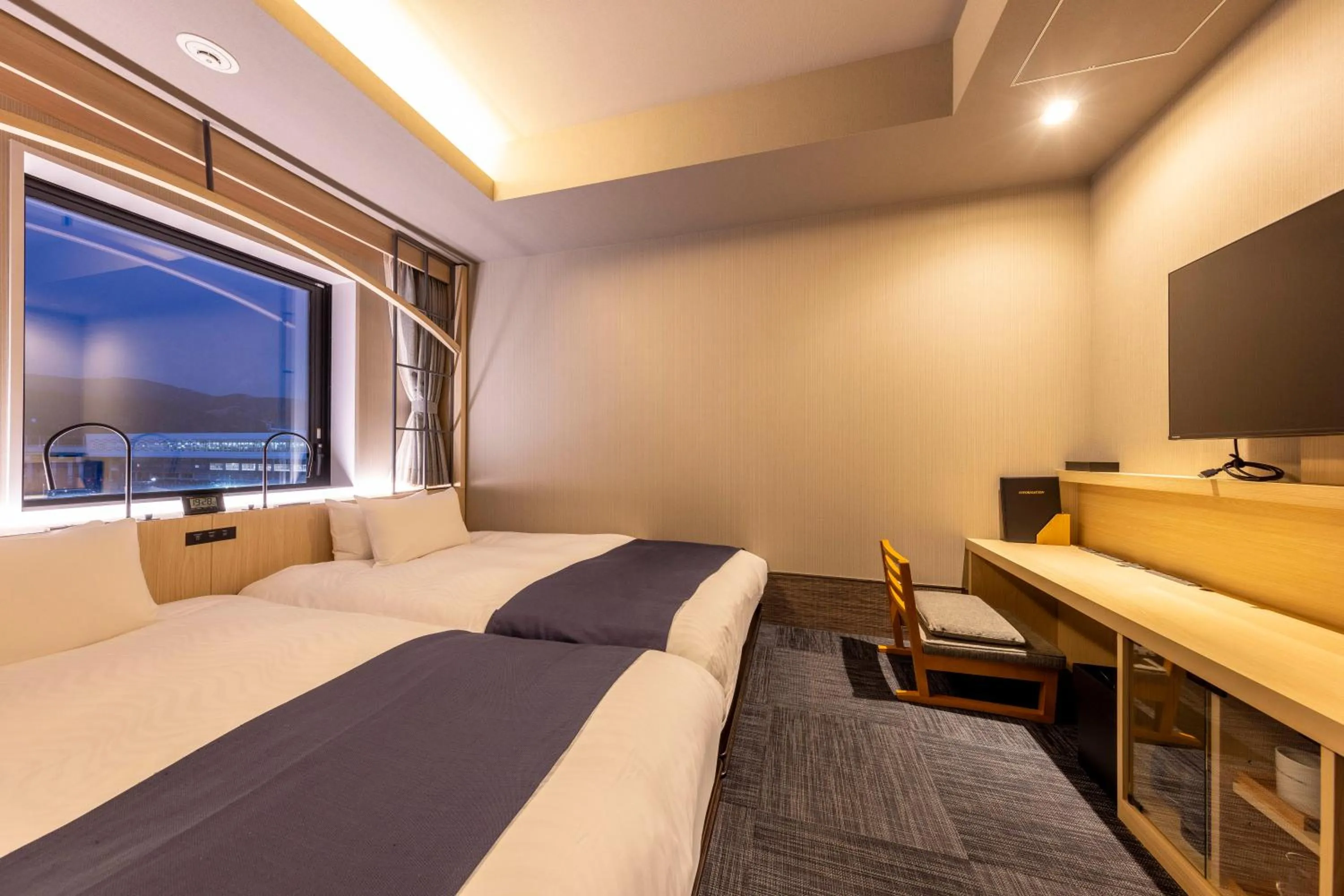 Photo of the whole room, Bed in Hotel Granbinario Tsuruga