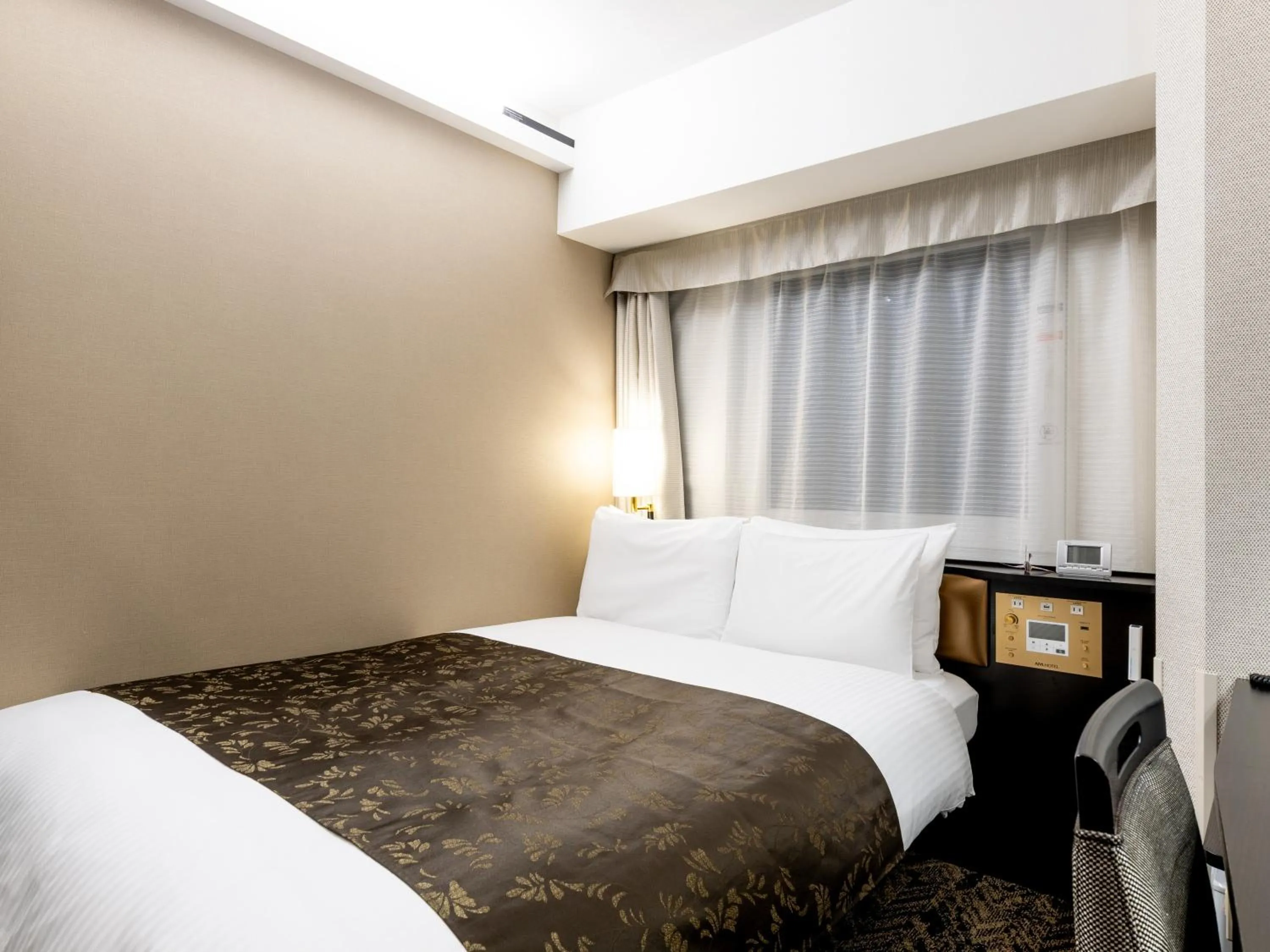 Photo of the whole room, Bed in APA Hotel & Resort Osaka Umeda Eki Tower