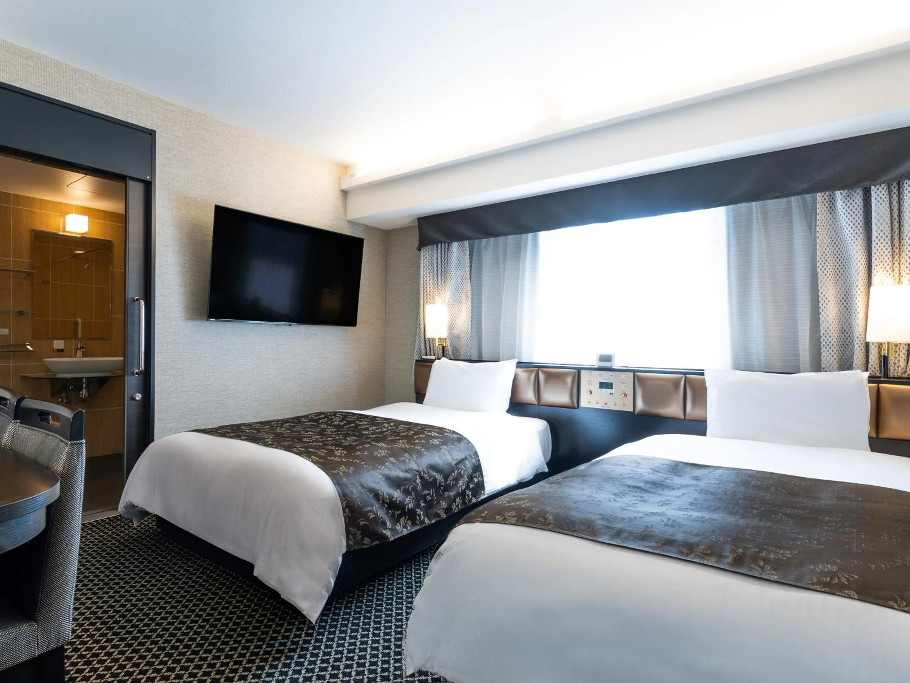 Photo of the whole room, Bed in APA Hotel & Resort Osaka Umeda Eki Tower