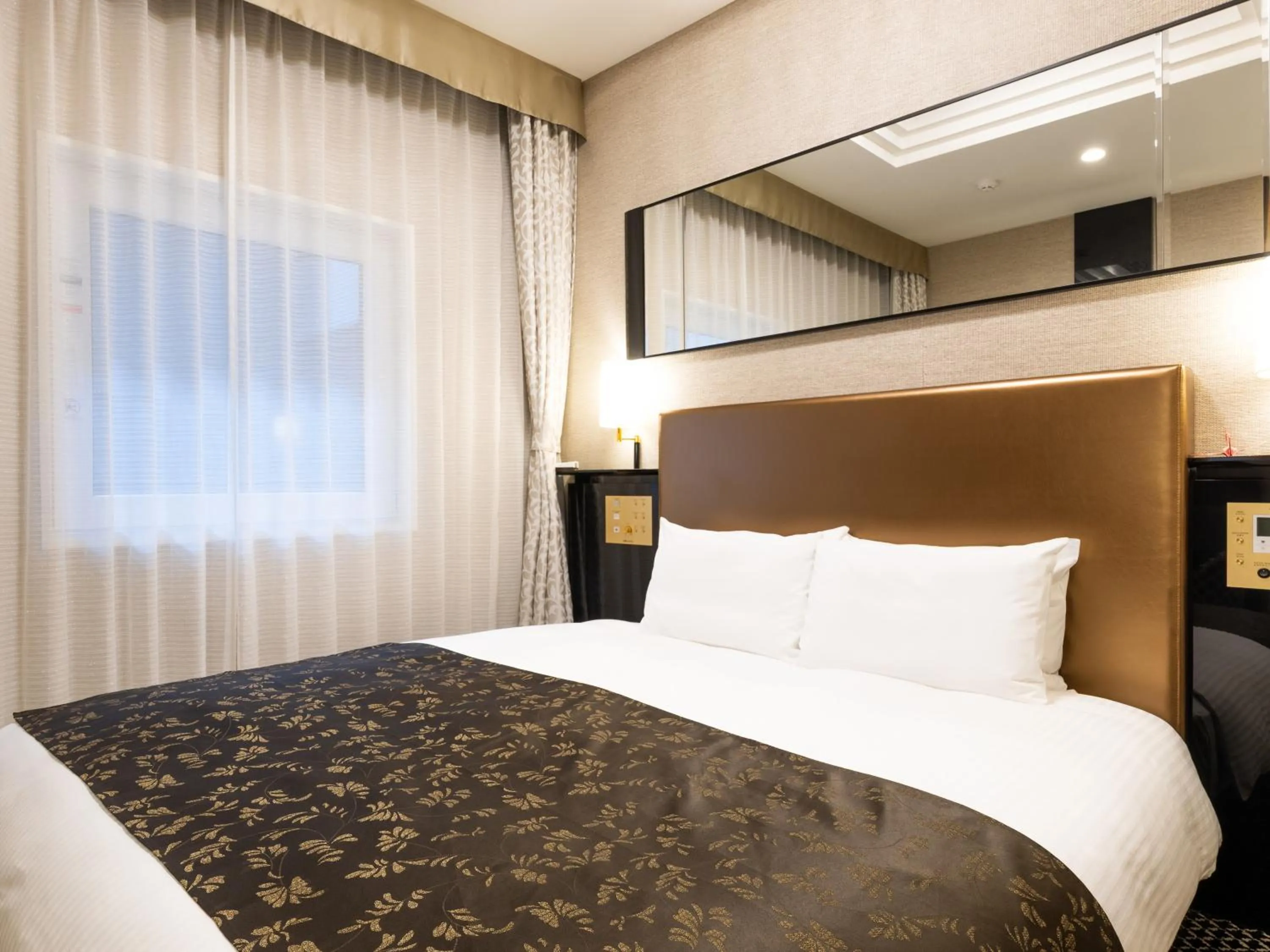 Photo of the whole room, Bed in APA Hotel & Resort Osaka Umeda Eki Tower