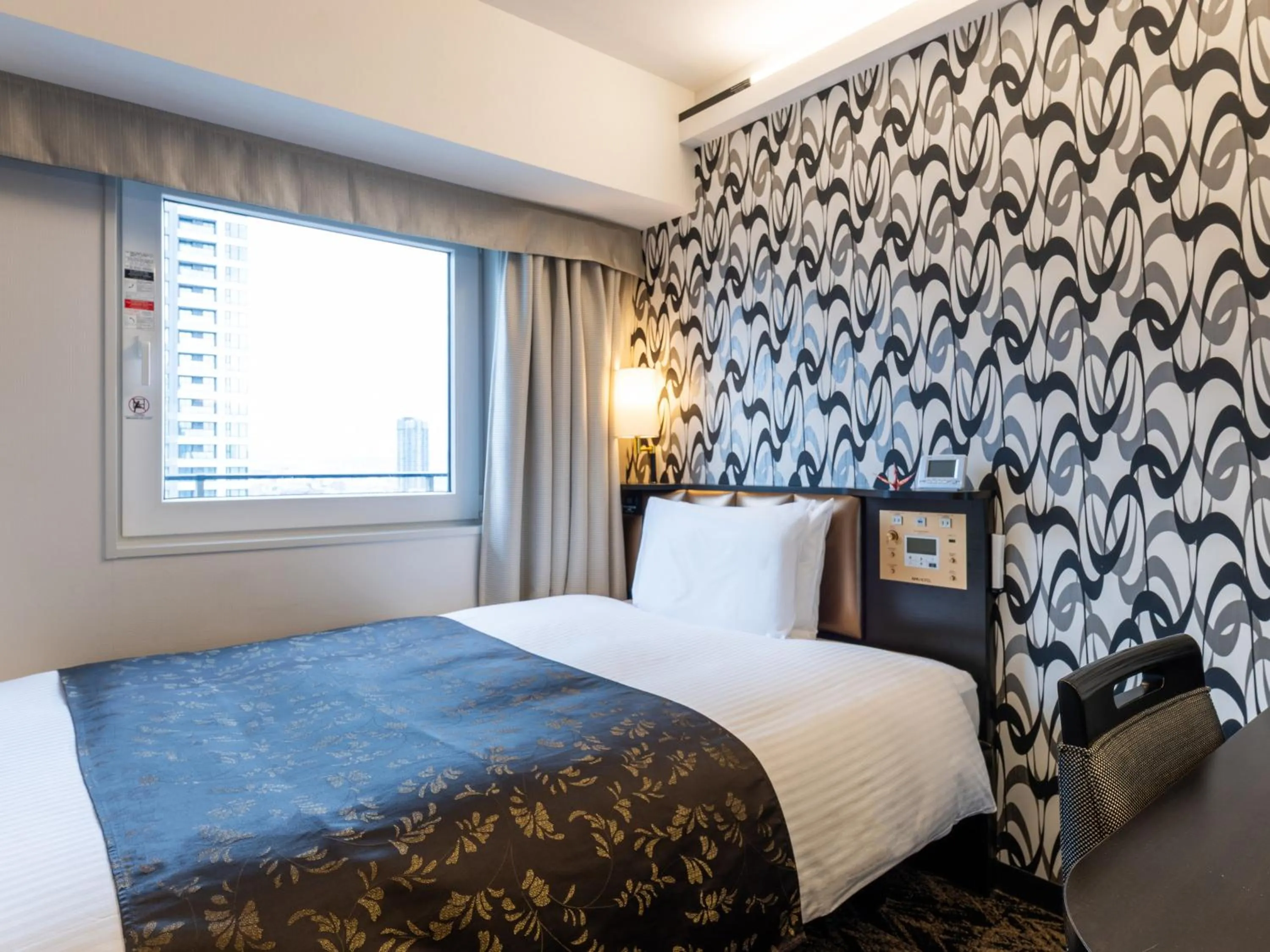 Photo of the whole room, Bed in APA Hotel & Resort Osaka Umeda Eki Tower