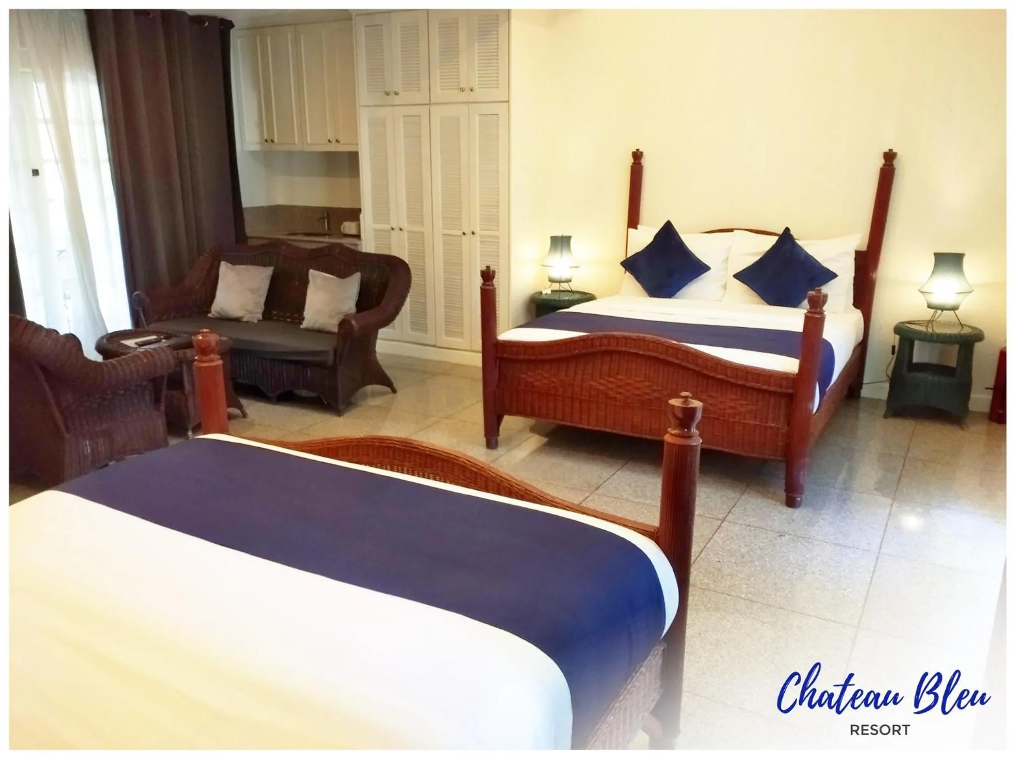 Bed in Chateau Bleu Resort