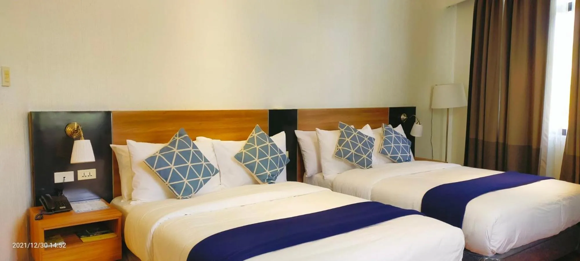 Bed in Chateau Bleu Resort