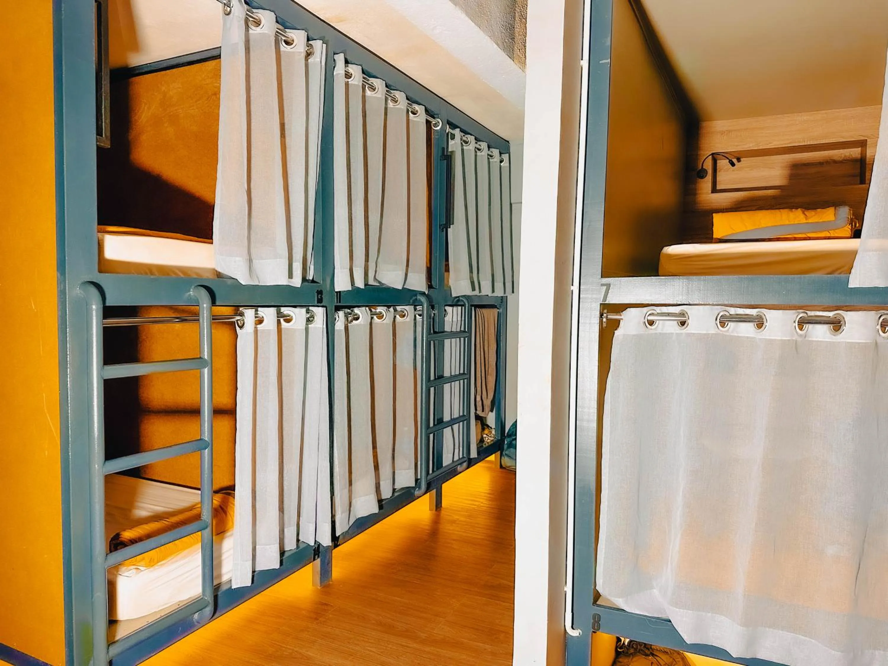 Bed in Arch Dormitorio Cenang