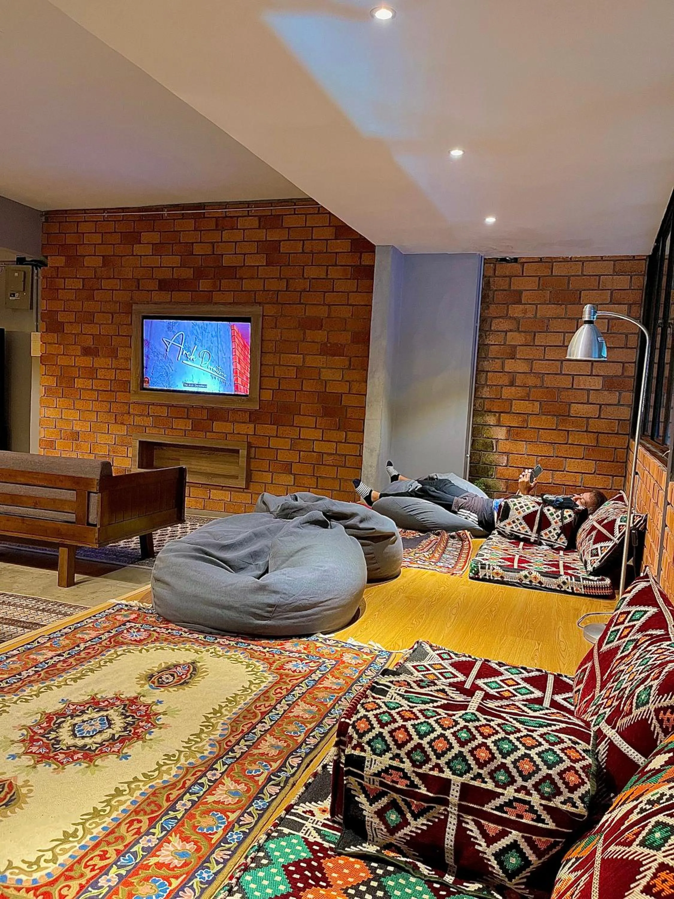 Communal lounge/ TV room, Bed in Arch Dormitorio Cenang