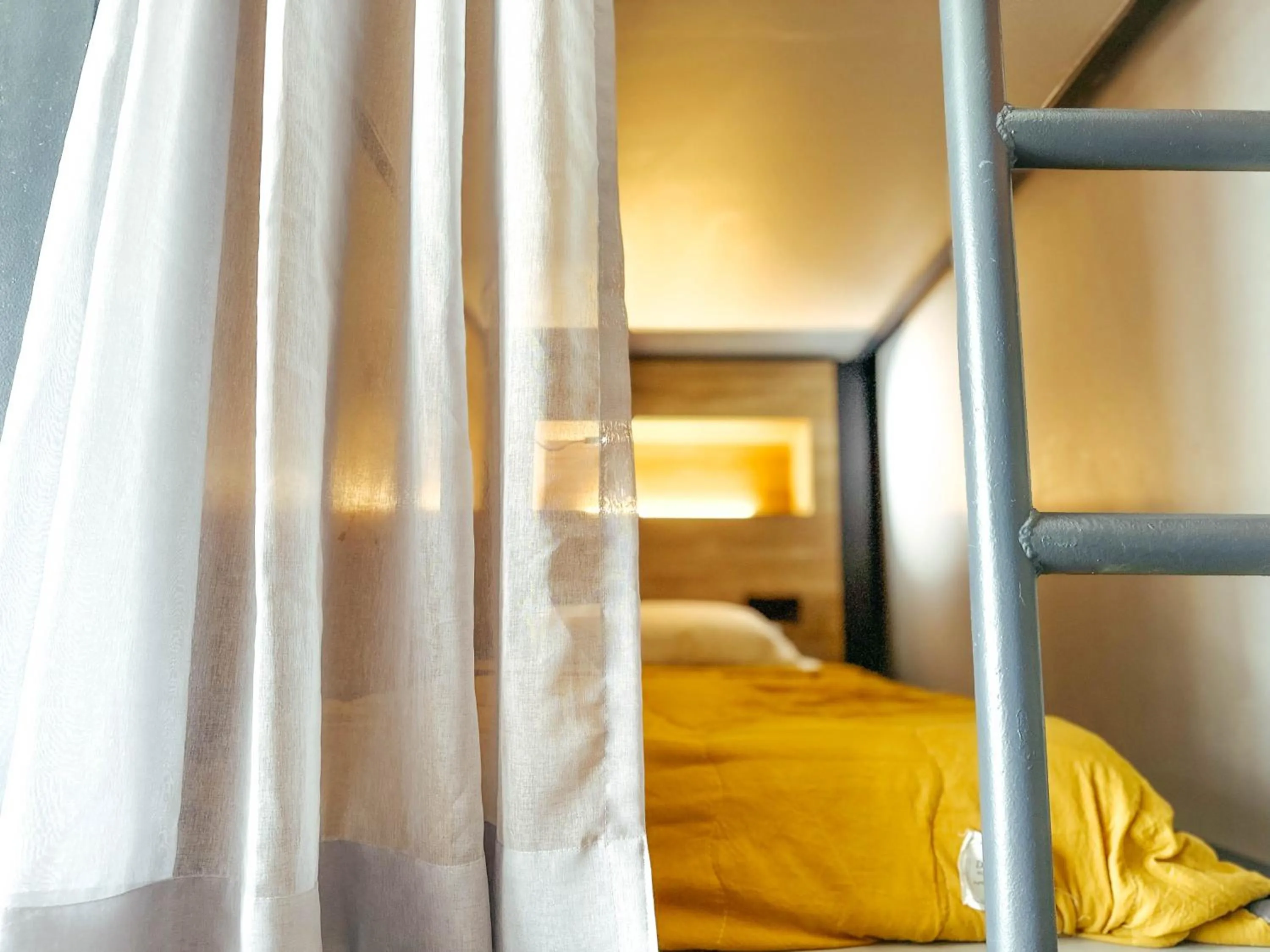 Bed in Arch Dormitorio Cenang