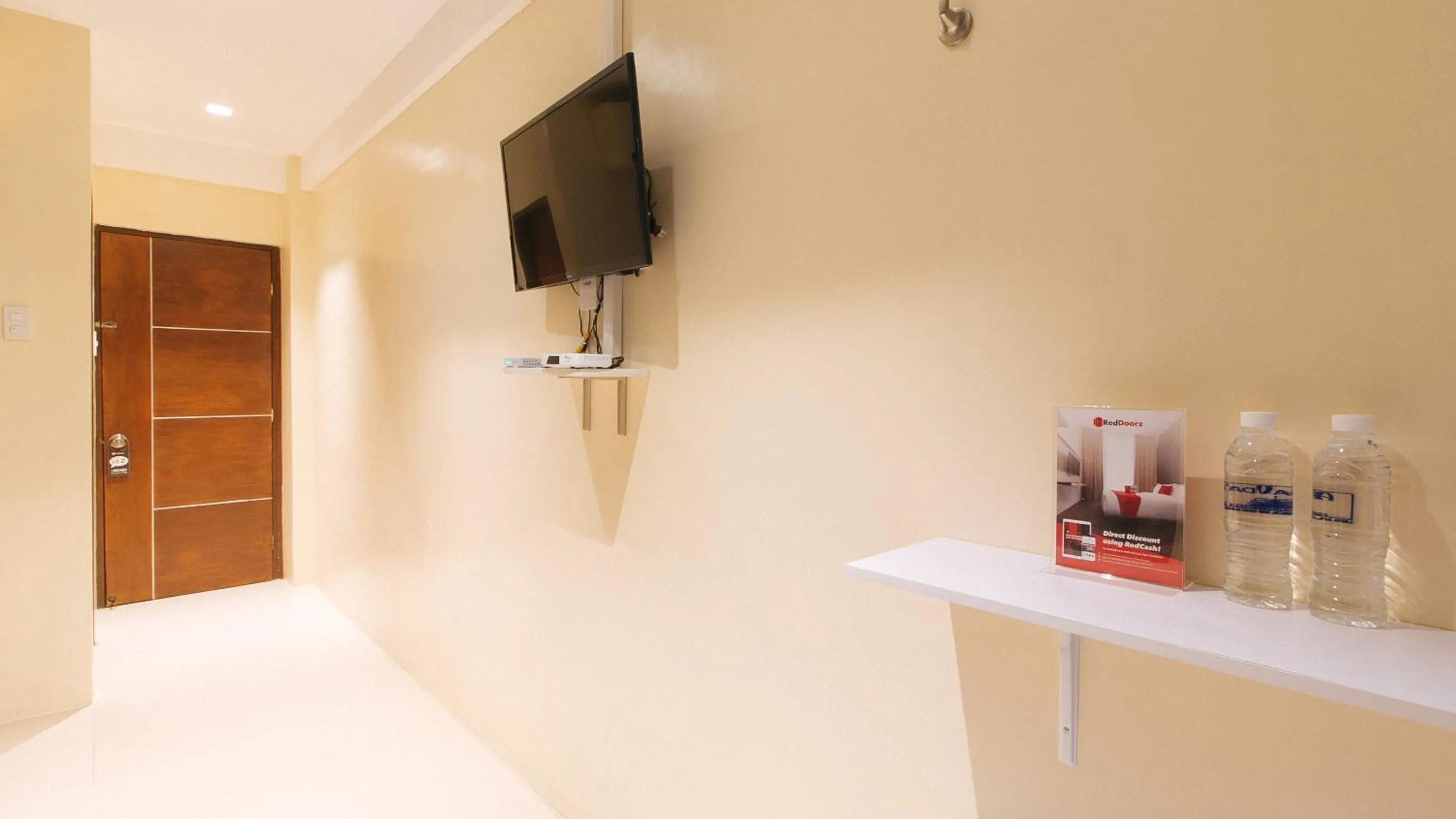 TV and multimedia in RedDooorz @ Laiya Vivo Hotel Batangas