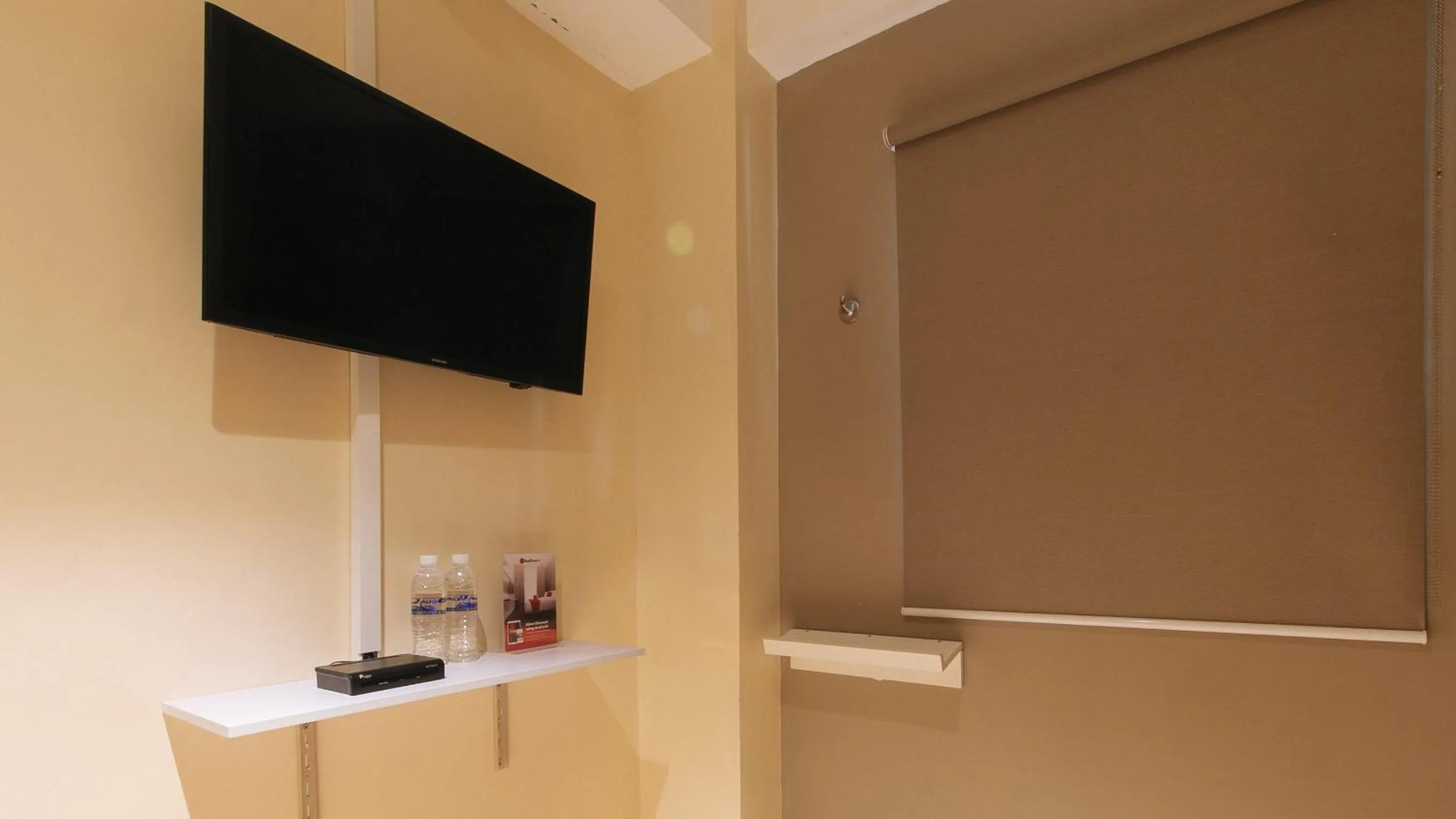 TV and multimedia in RedDooorz @ Laiya Vivo Hotel Batangas