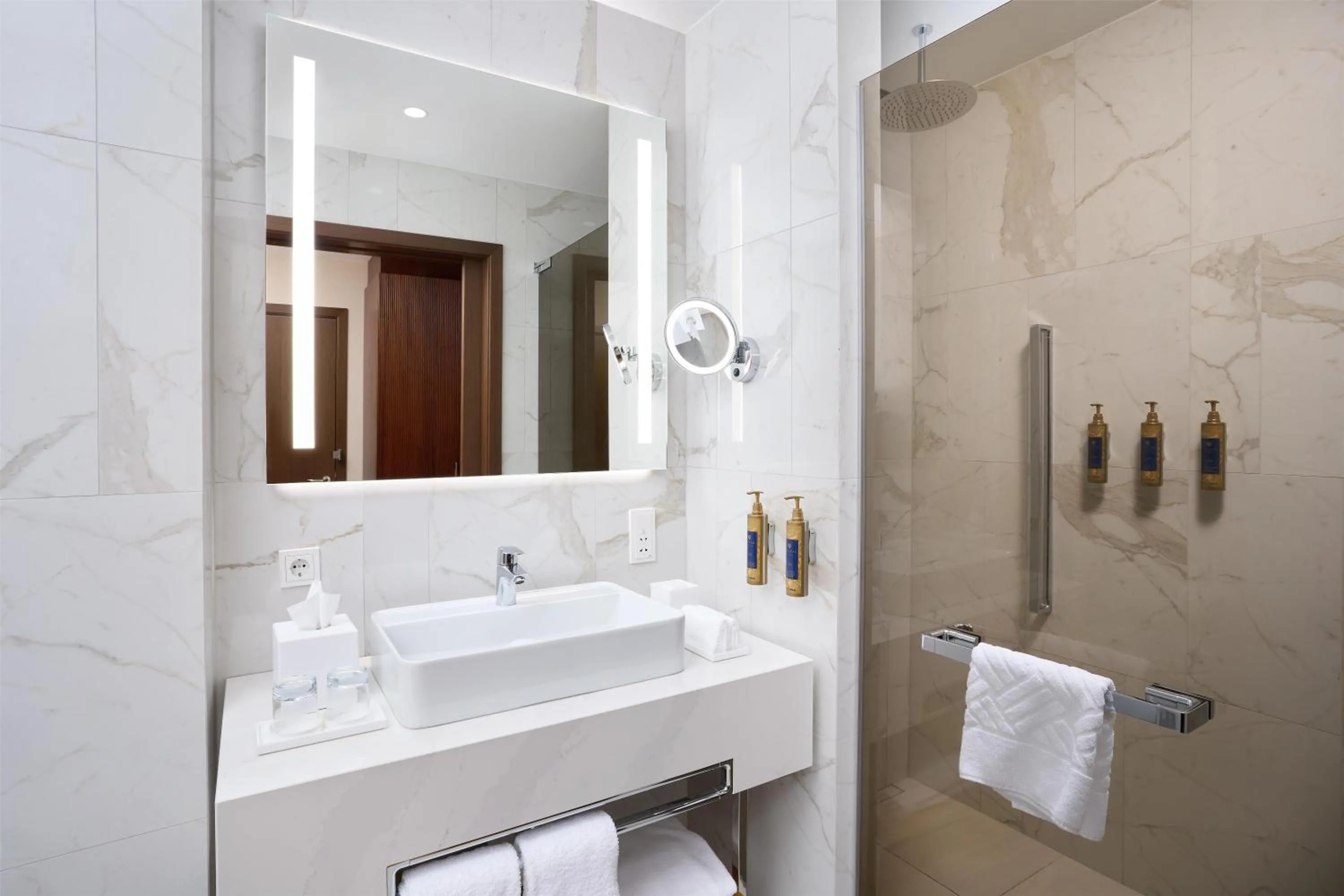 Bathroom in Iceland Parliament Hotel, Curio Collection By Hilton