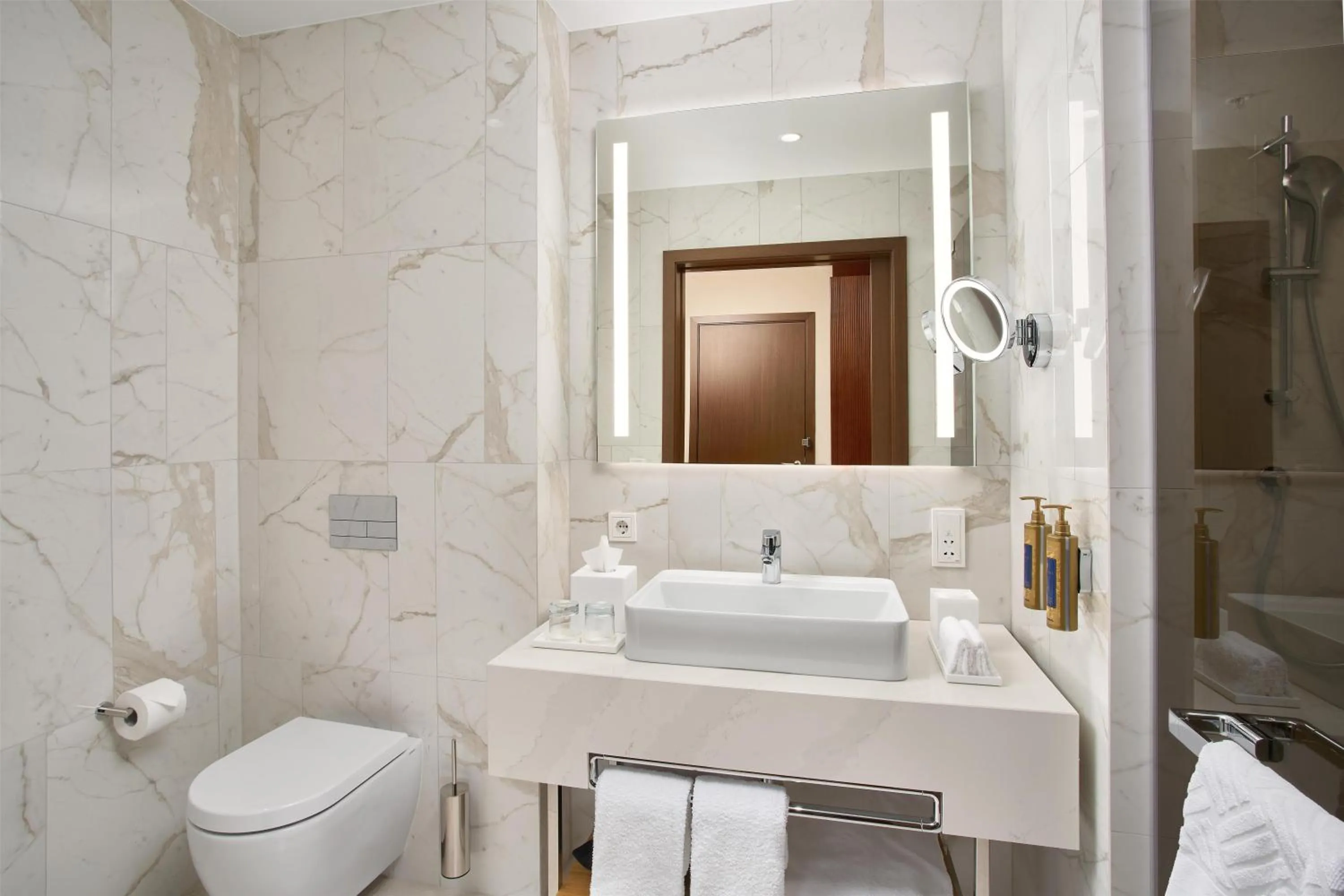 Bathroom in Iceland Parliament Hotel, Curio Collection By Hilton