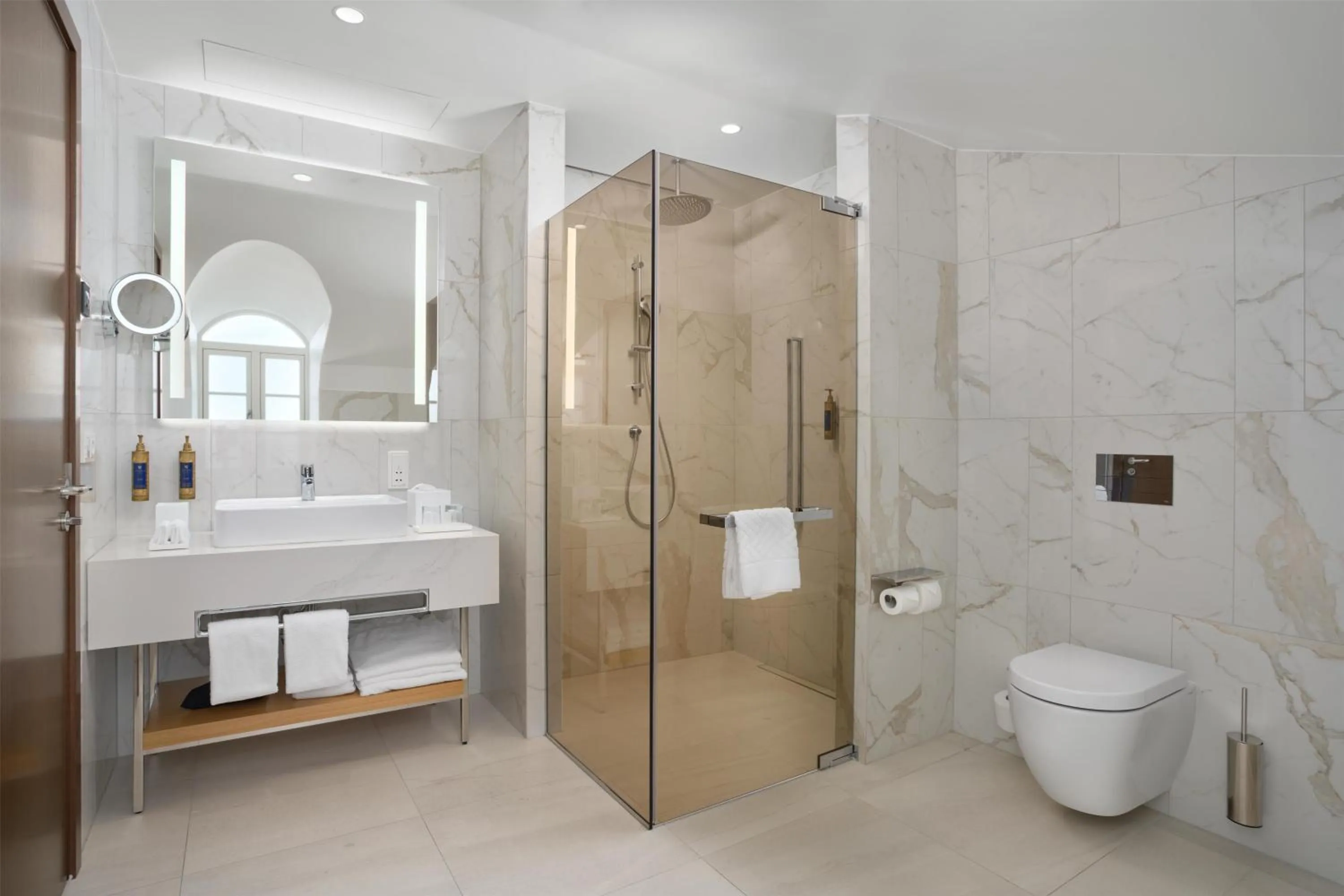 Bathroom in Iceland Parliament Hotel, Curio Collection By Hilton