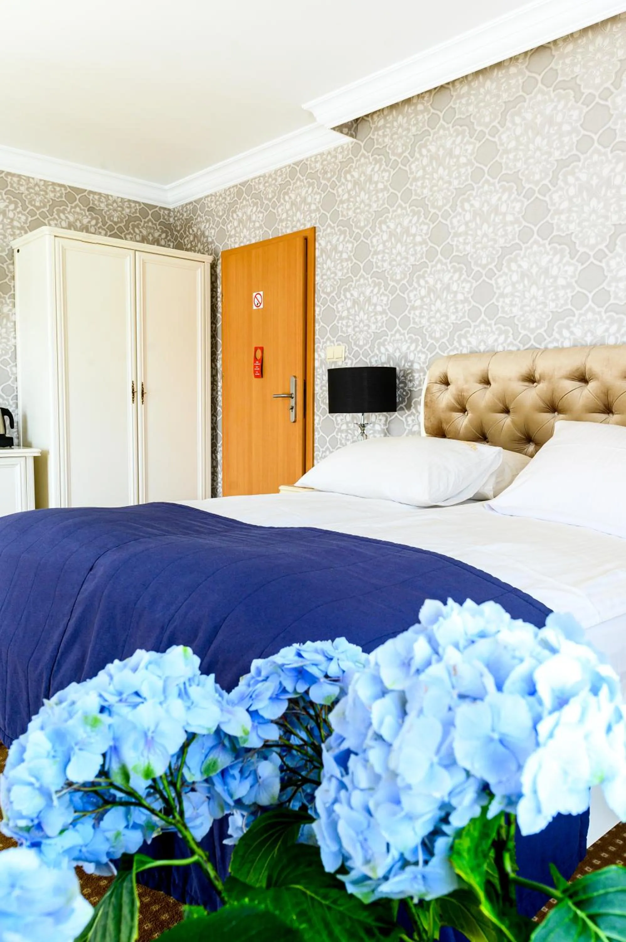 Photo of the whole room, Bed in Moris Boutique Beach Hotel