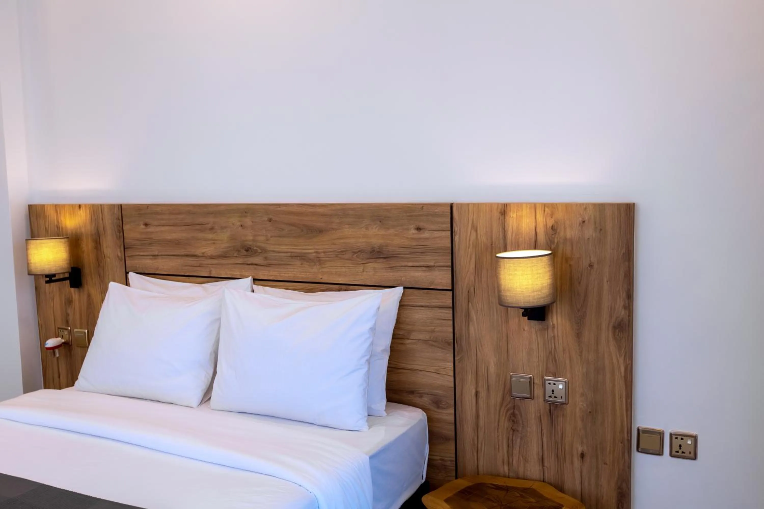 Bed in MAYA Residences Rwanda