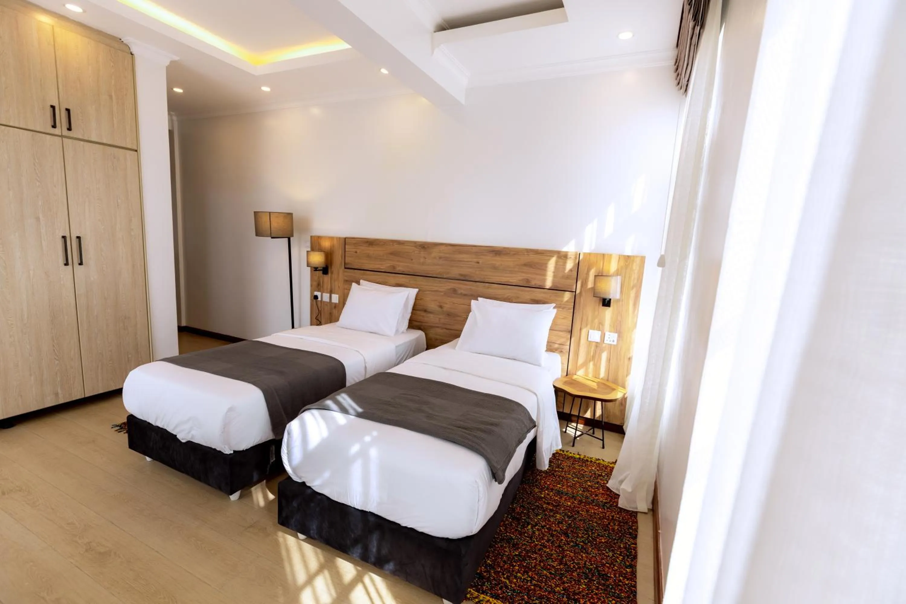 Bed in MAYA Residences Rwanda