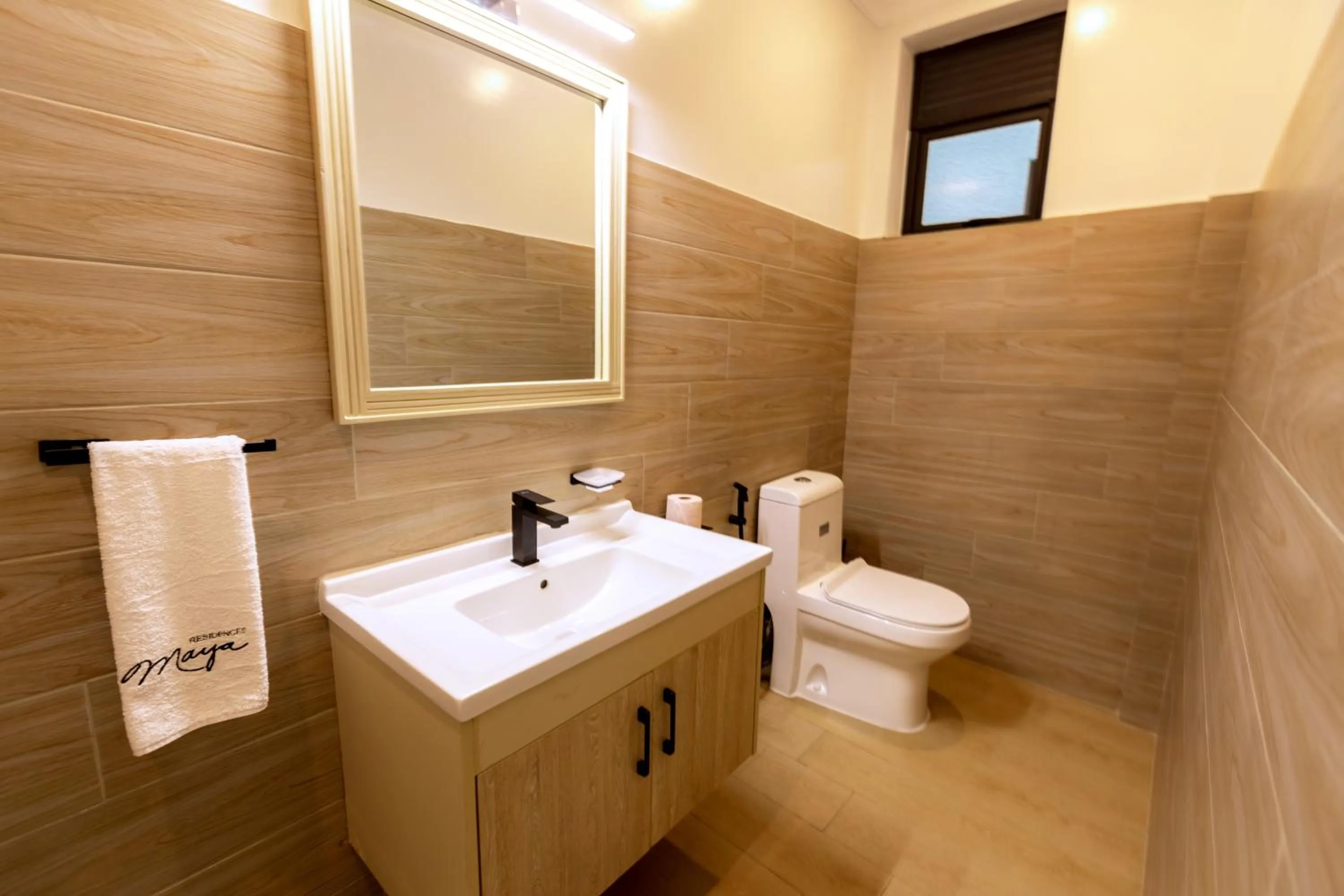 Toilet in MAYA Residences Rwanda