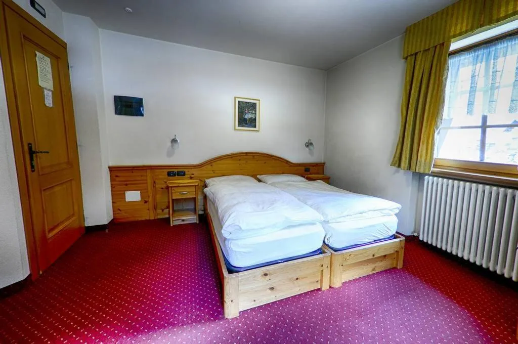 Bed in Garni Baita Cecilia