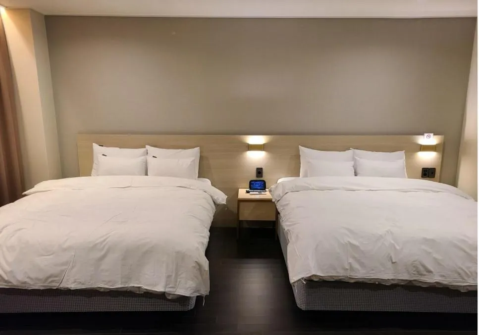 Bed in Hotel SUMMIT