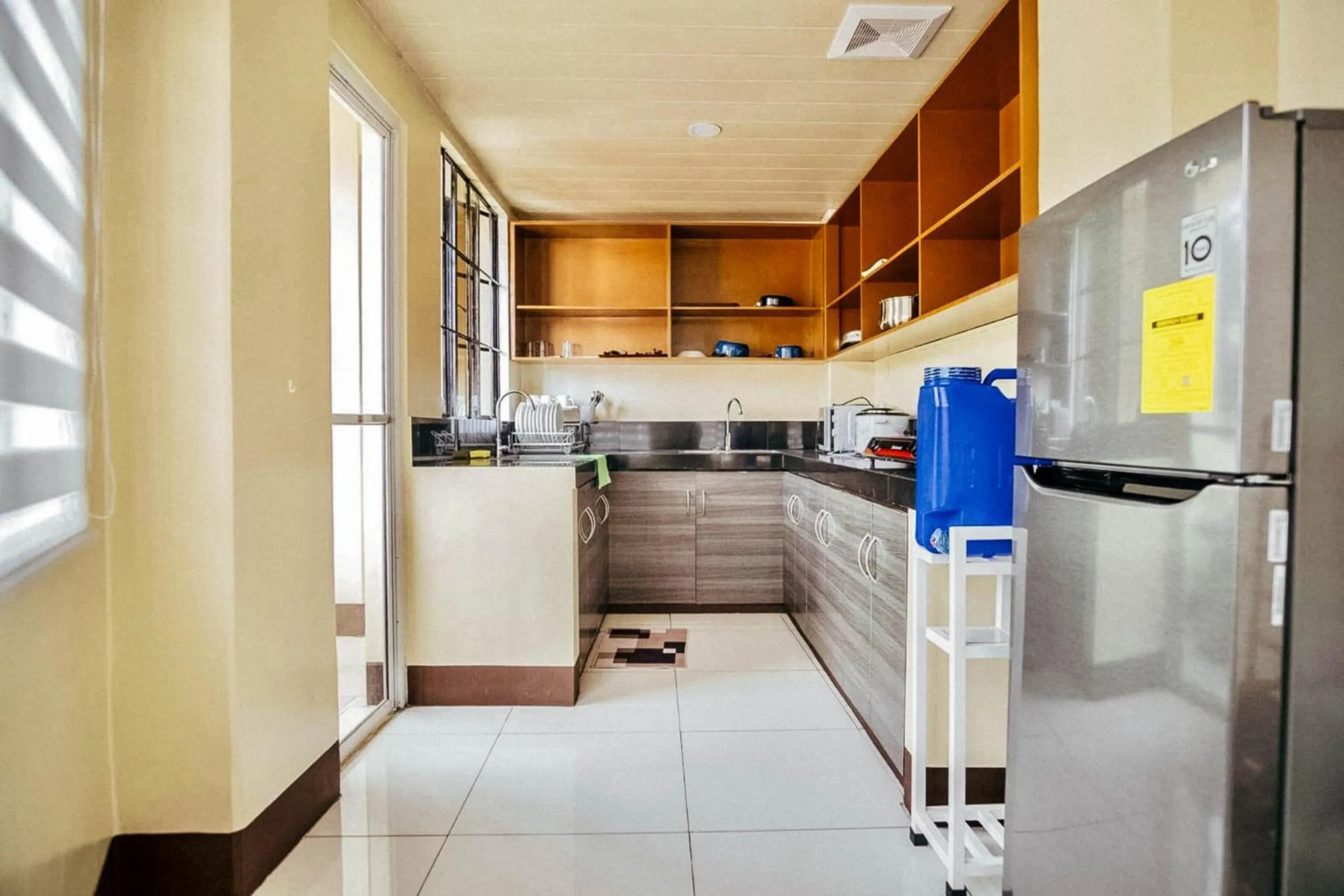 Kitchen or kitchenette in Campo Filipino Dormitelle powered by Cocotel
