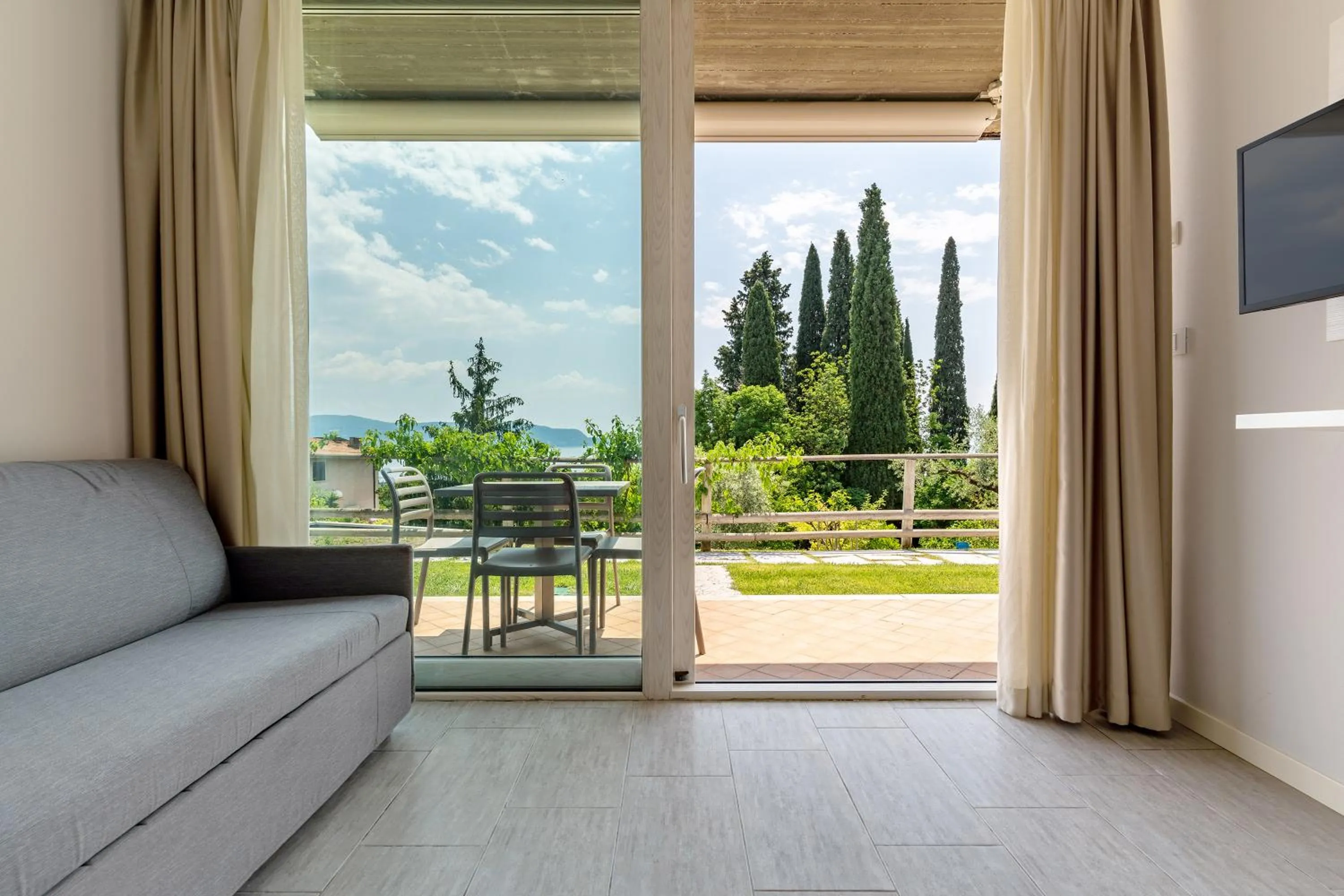 Living room in La Chioma di Berenice Garda Residence