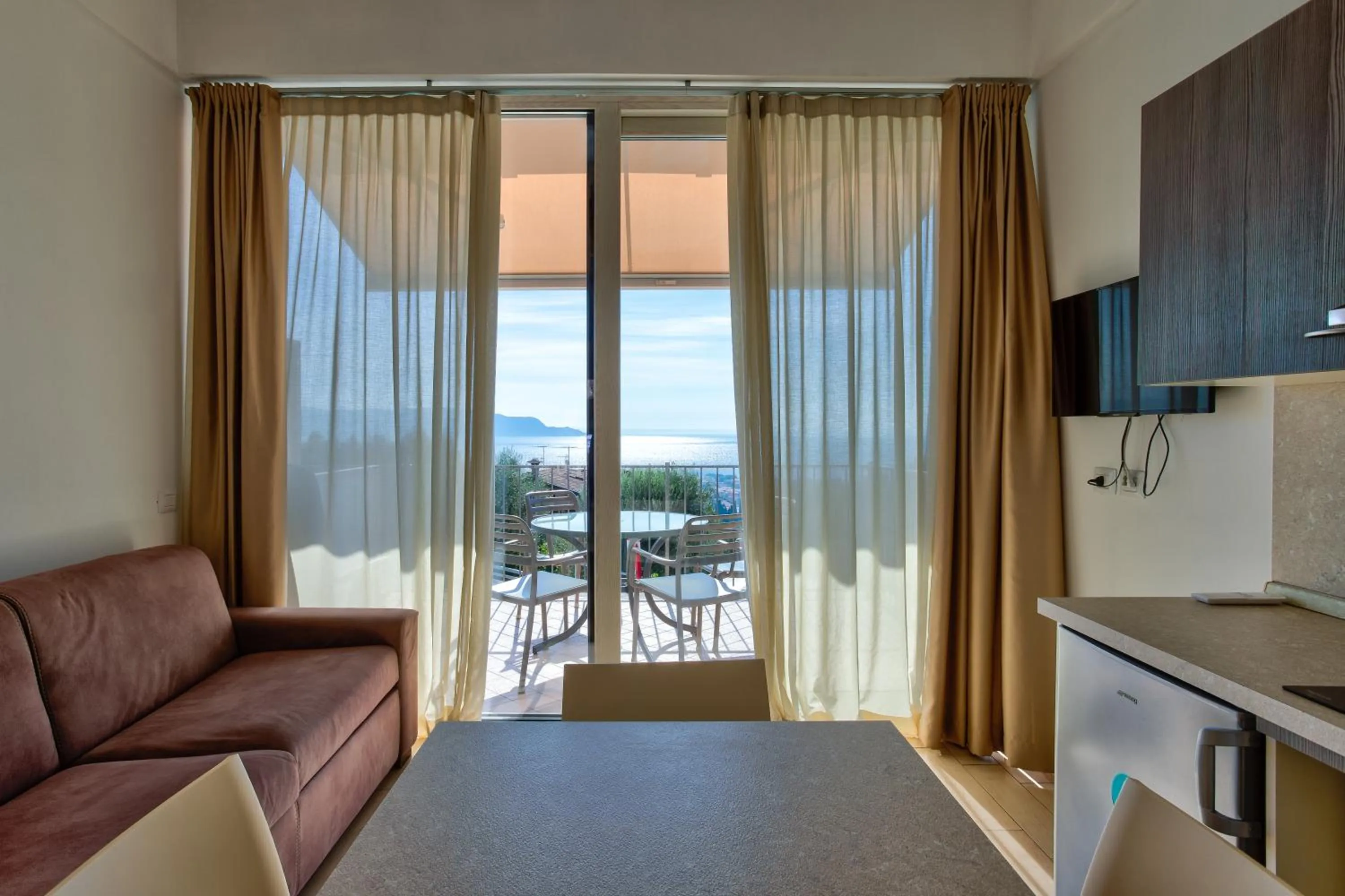 Living room in La Chioma di Berenice Garda Residence