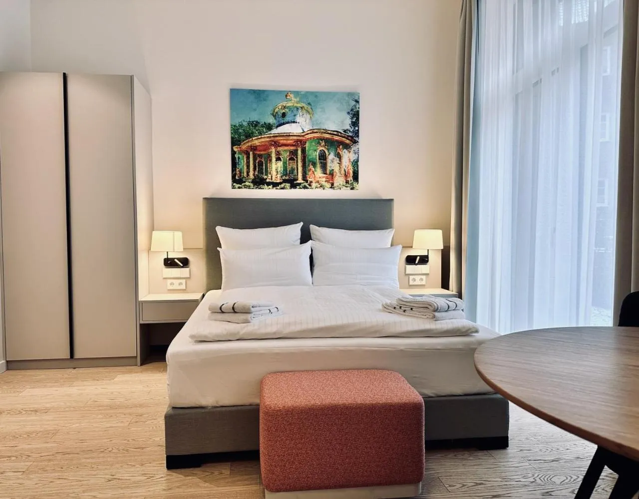 Bed in Elisapart - Apartments am Sommerschloss