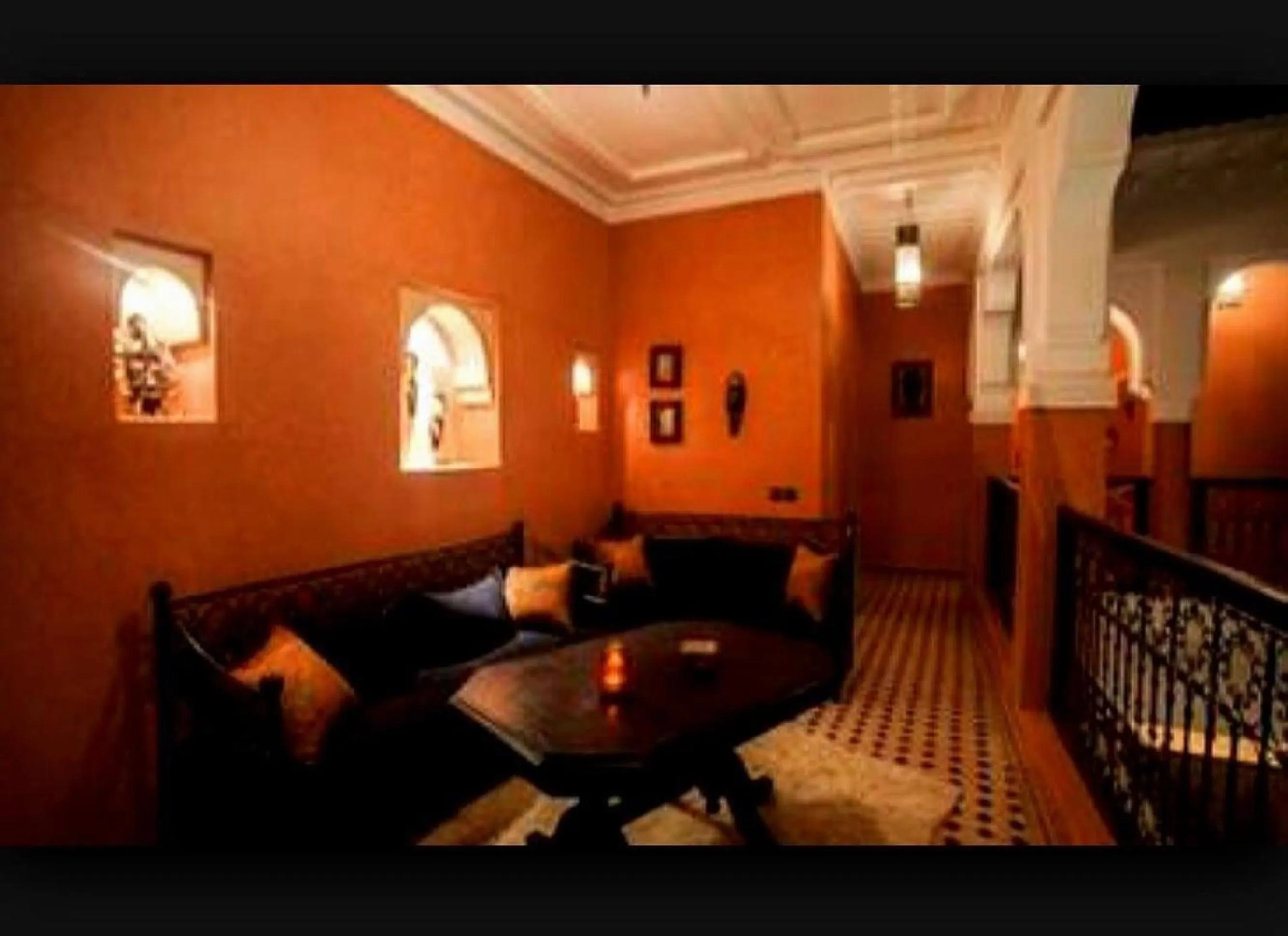 Communal lounge/ TV room in Riad Mounlight