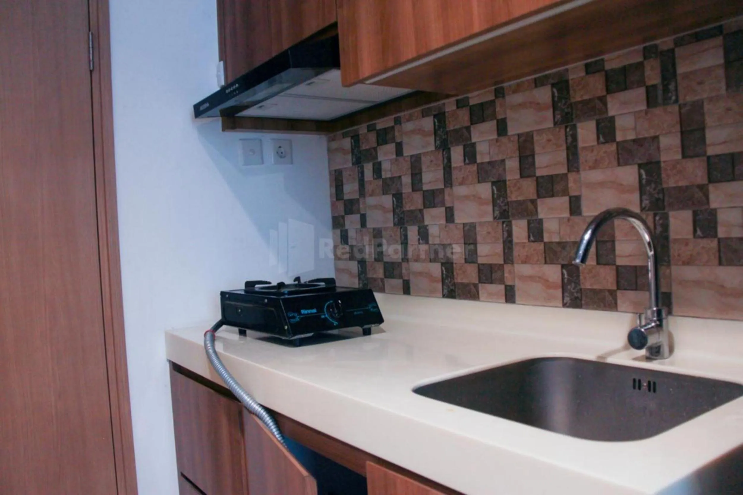 Kitchen or kitchenette in RedLiving Apartemen TreeParkCity - My Rooms Tower Alpine