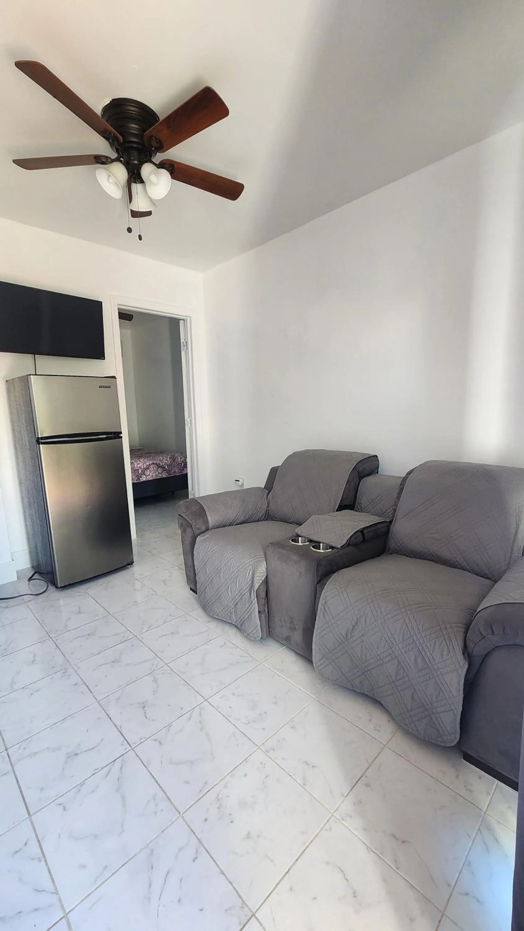 Bed in Small cozy apartment