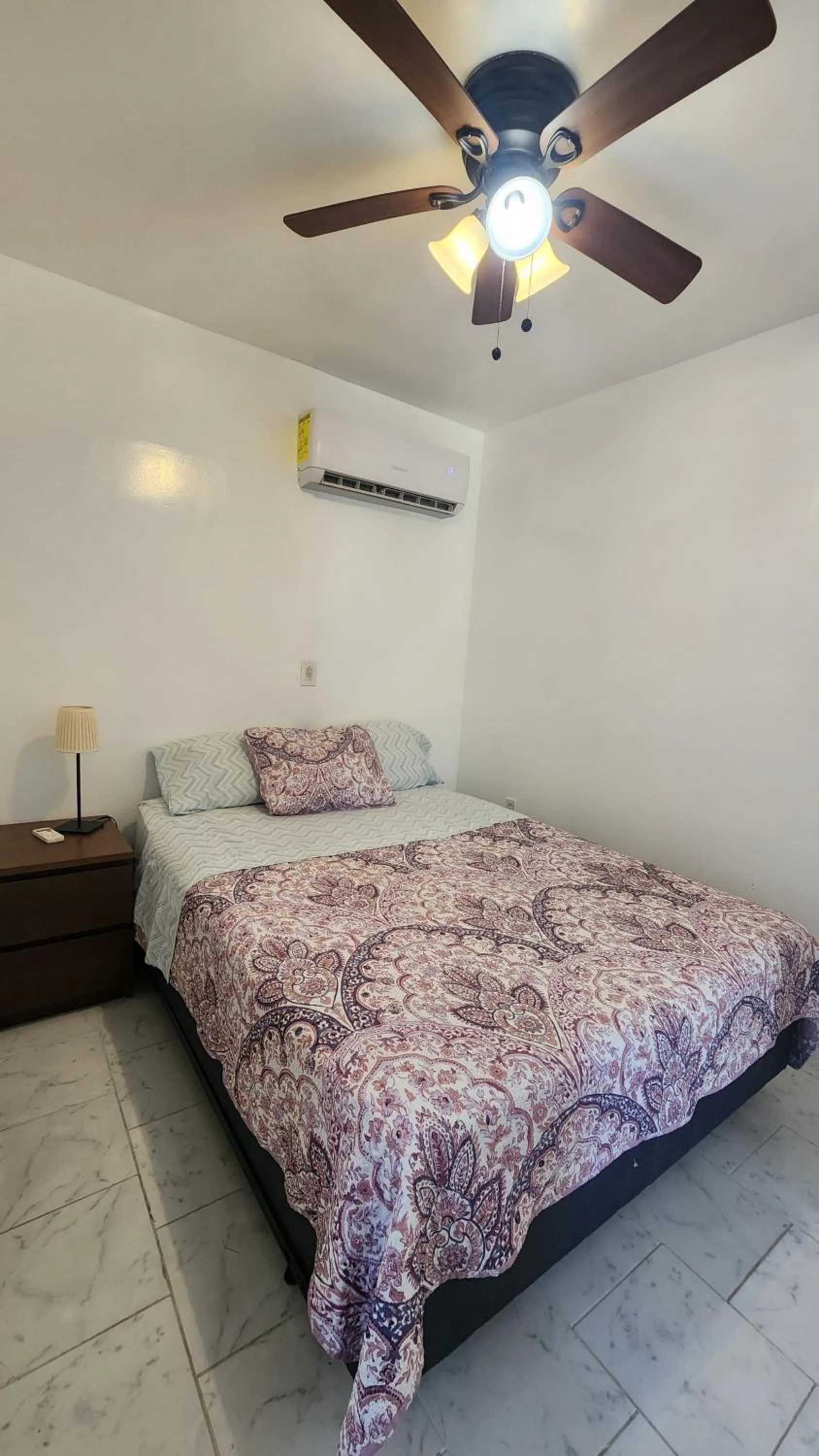 Bed in Small cozy apartment