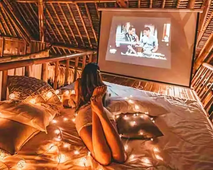 Communal lounge/ TV room, Bed in La Royale Nusa Penida