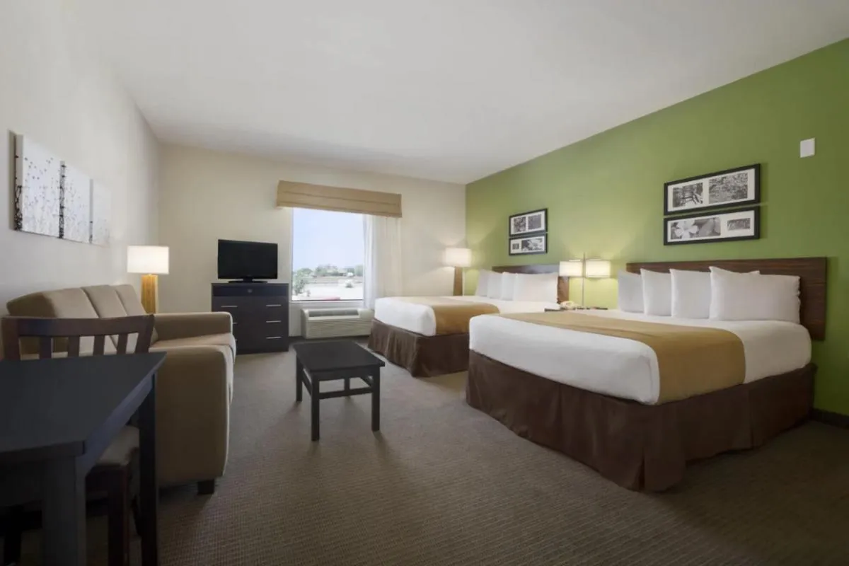 Bed in PetroStay Inn & Suites Cotulla