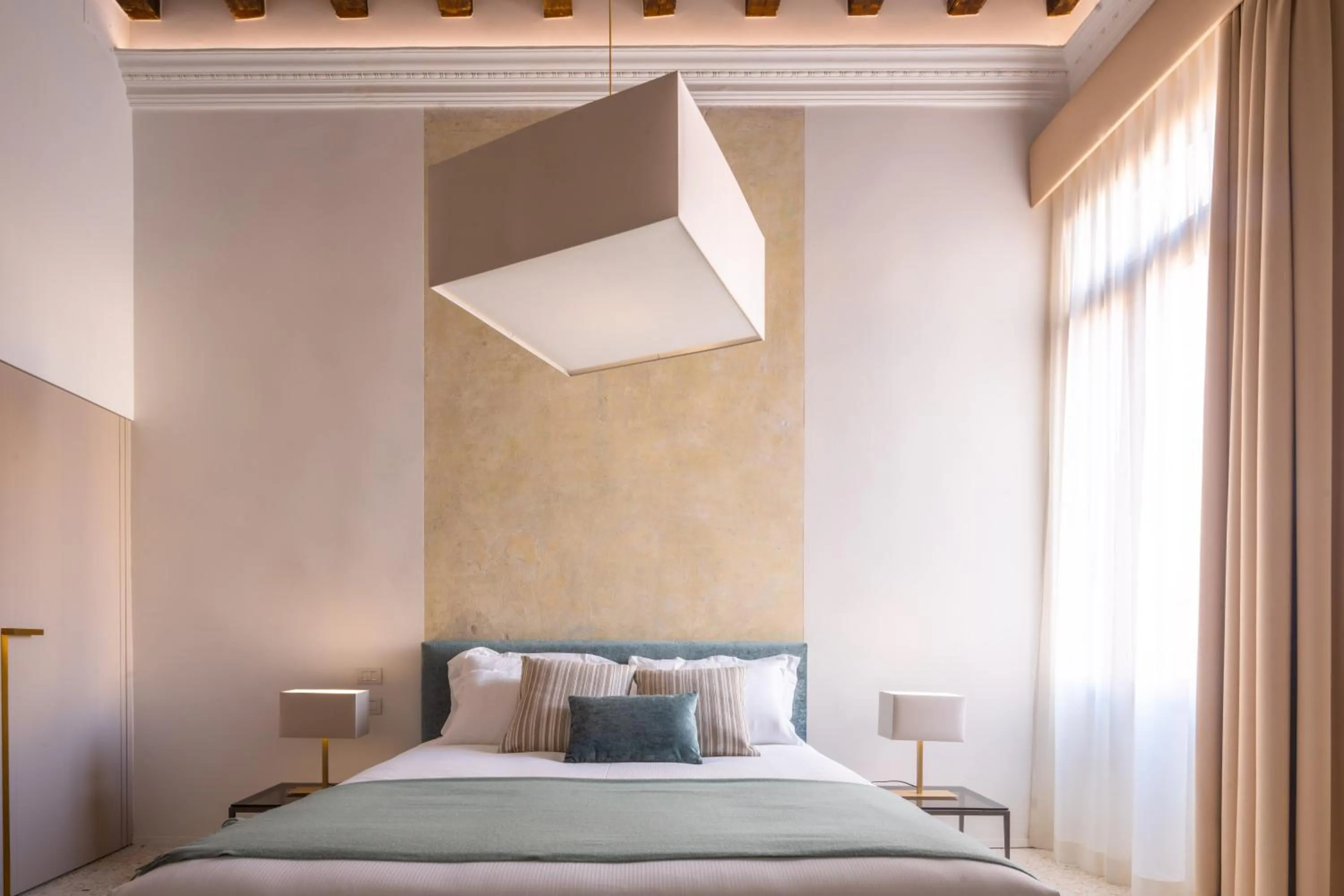 Bed in Ninfea Luxury Suites