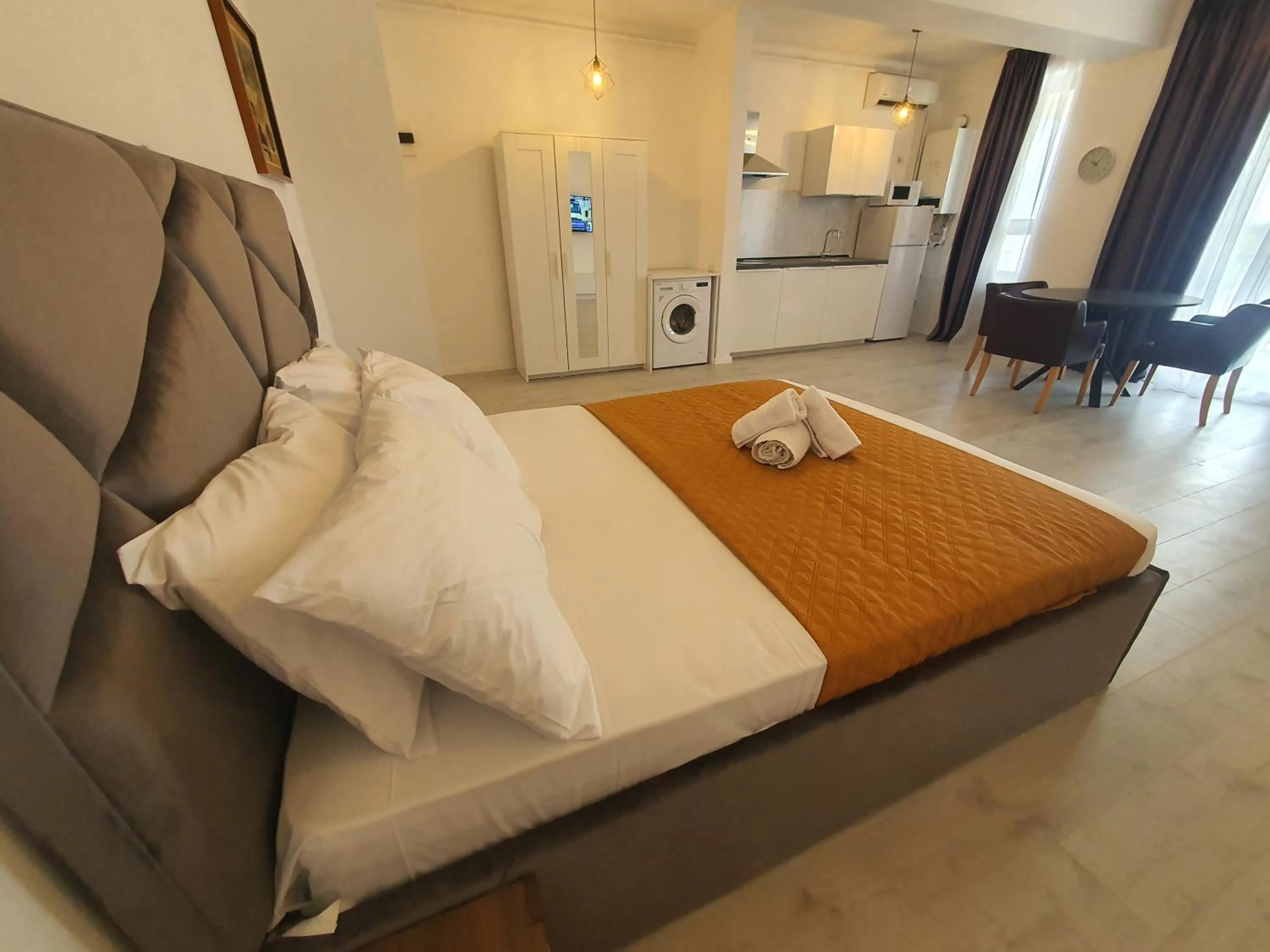 Bed in Grey Residence Apartments