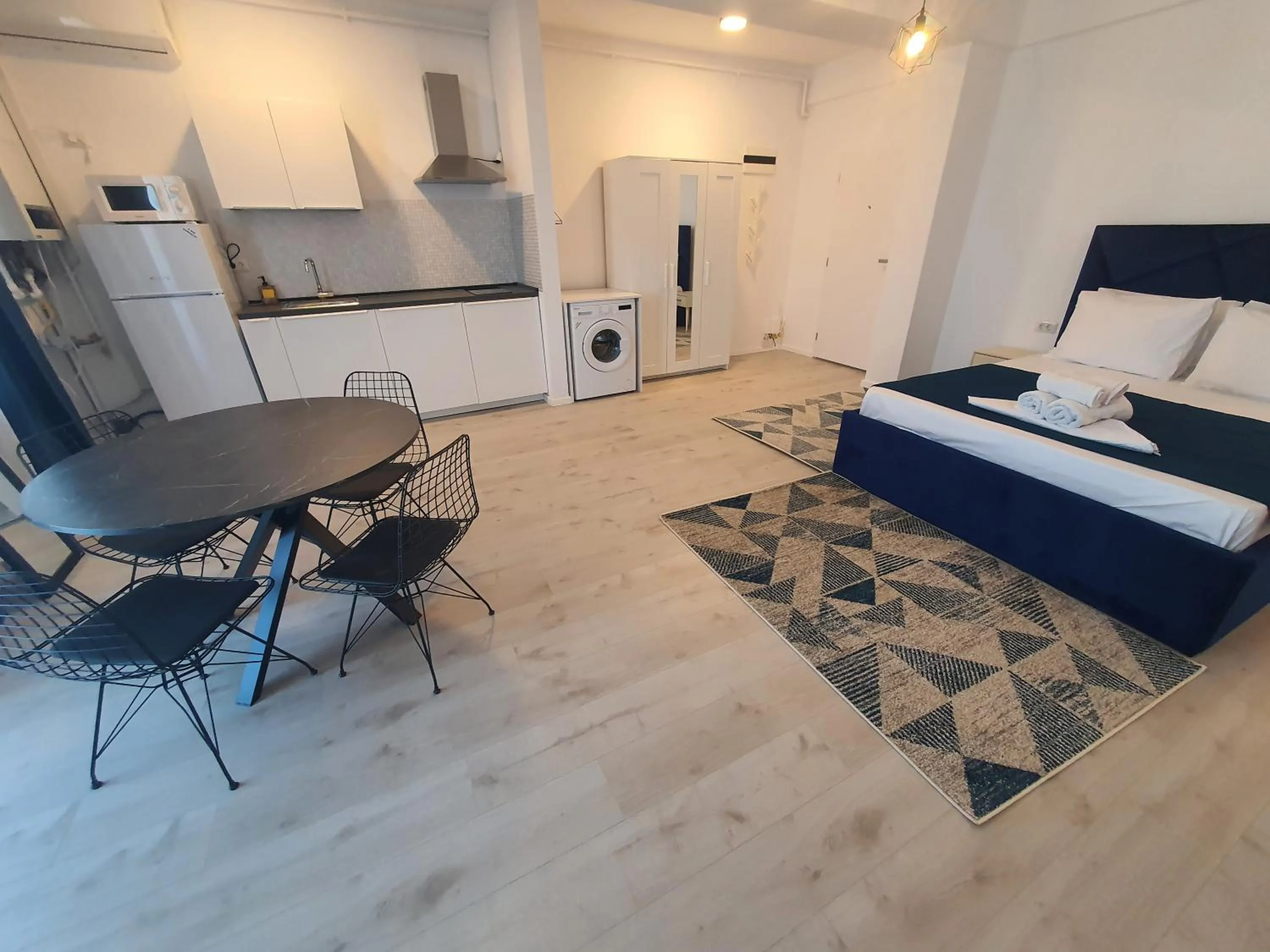 TV and multimedia, Bed in Grey Residence Apartments