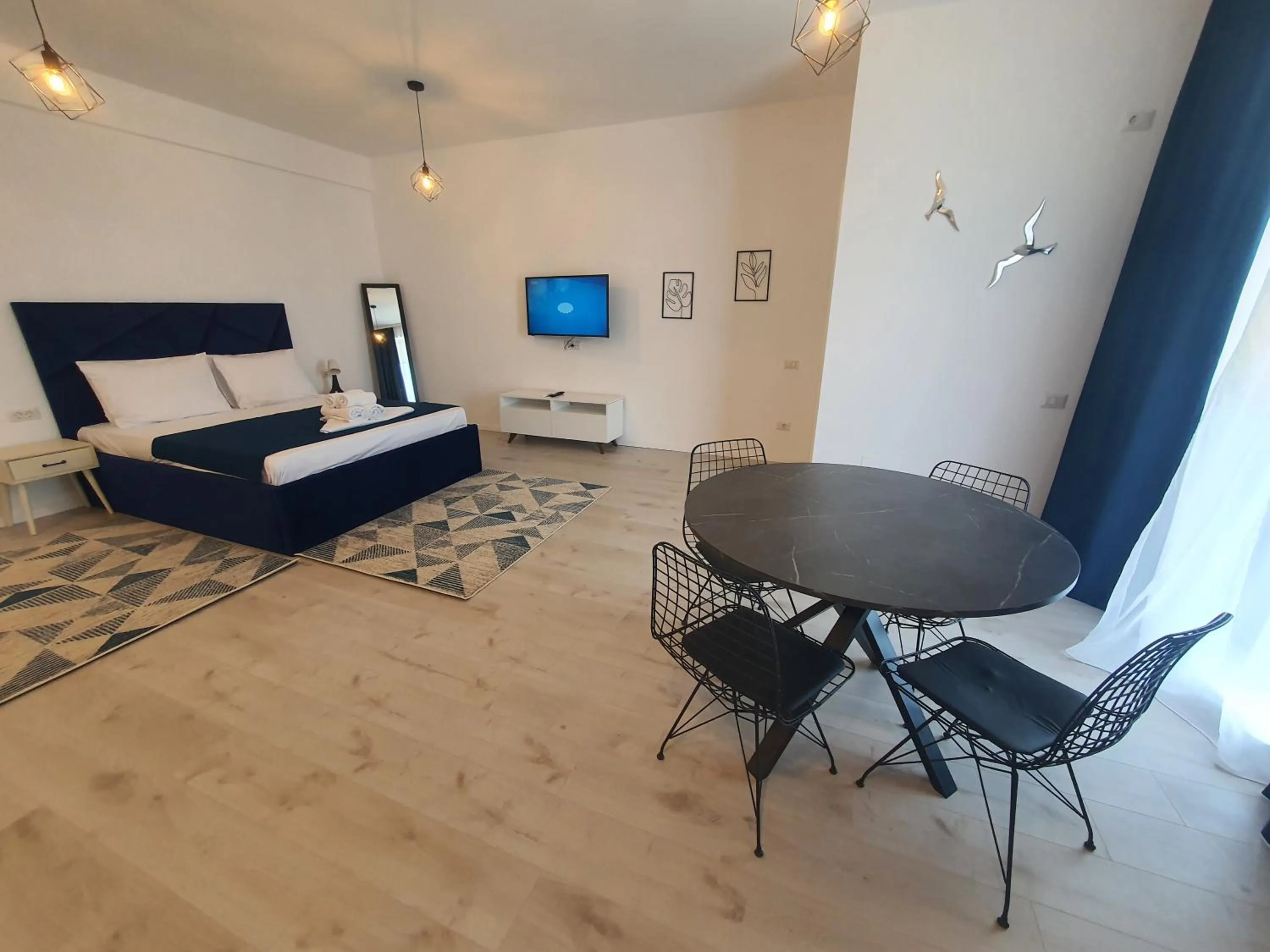 Bed in Grey Residence Apartments