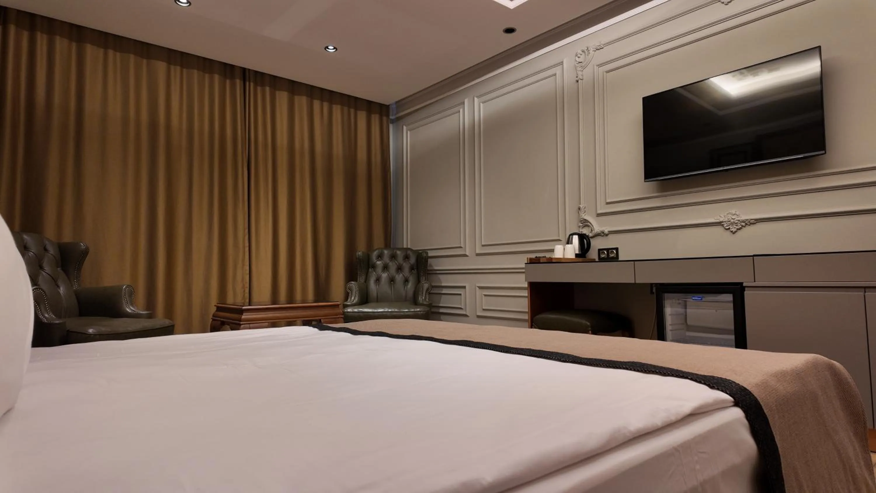 Bed in Lala Grand Hotel