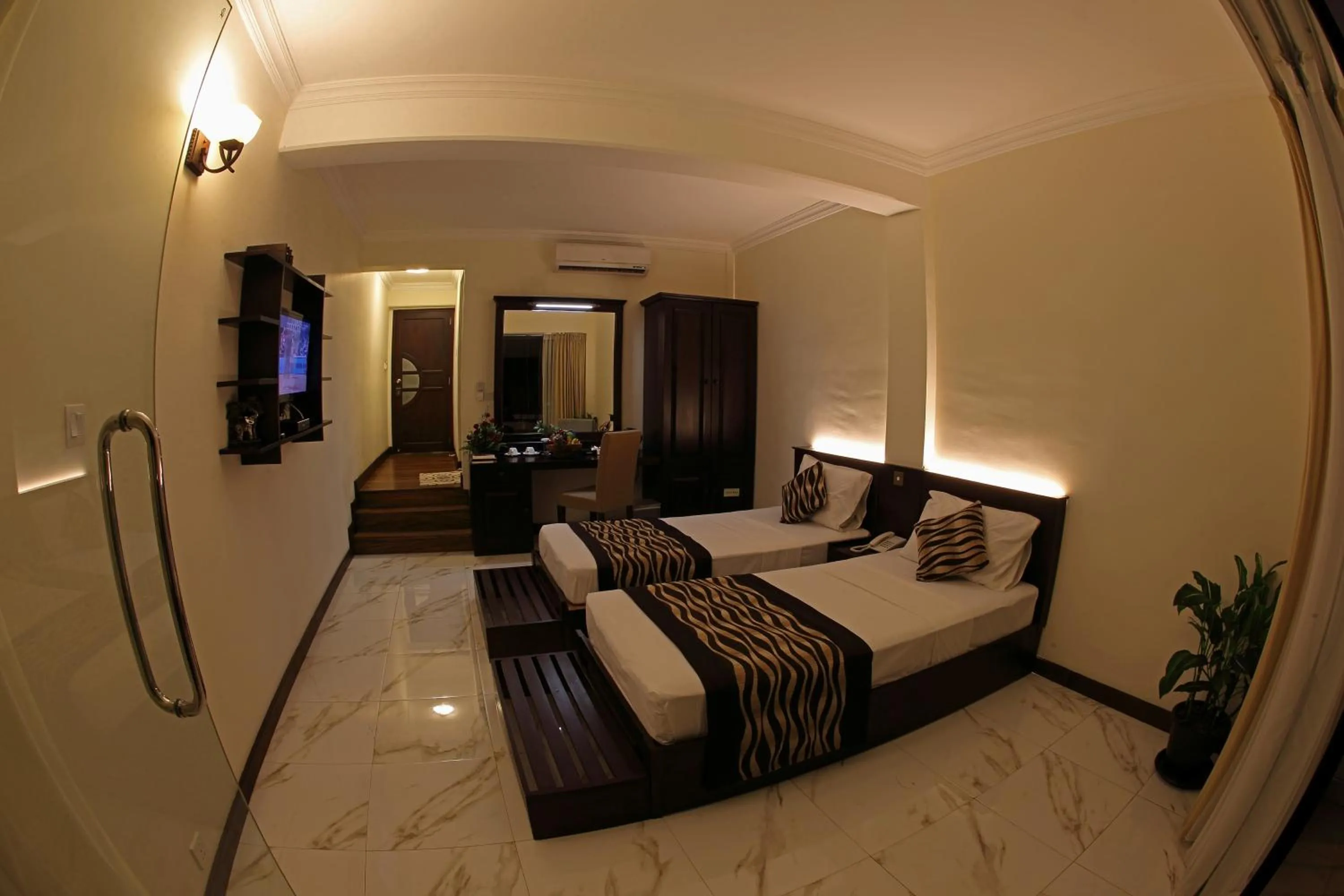 Photo of the whole room, Bed in Cafe Aroma Inn