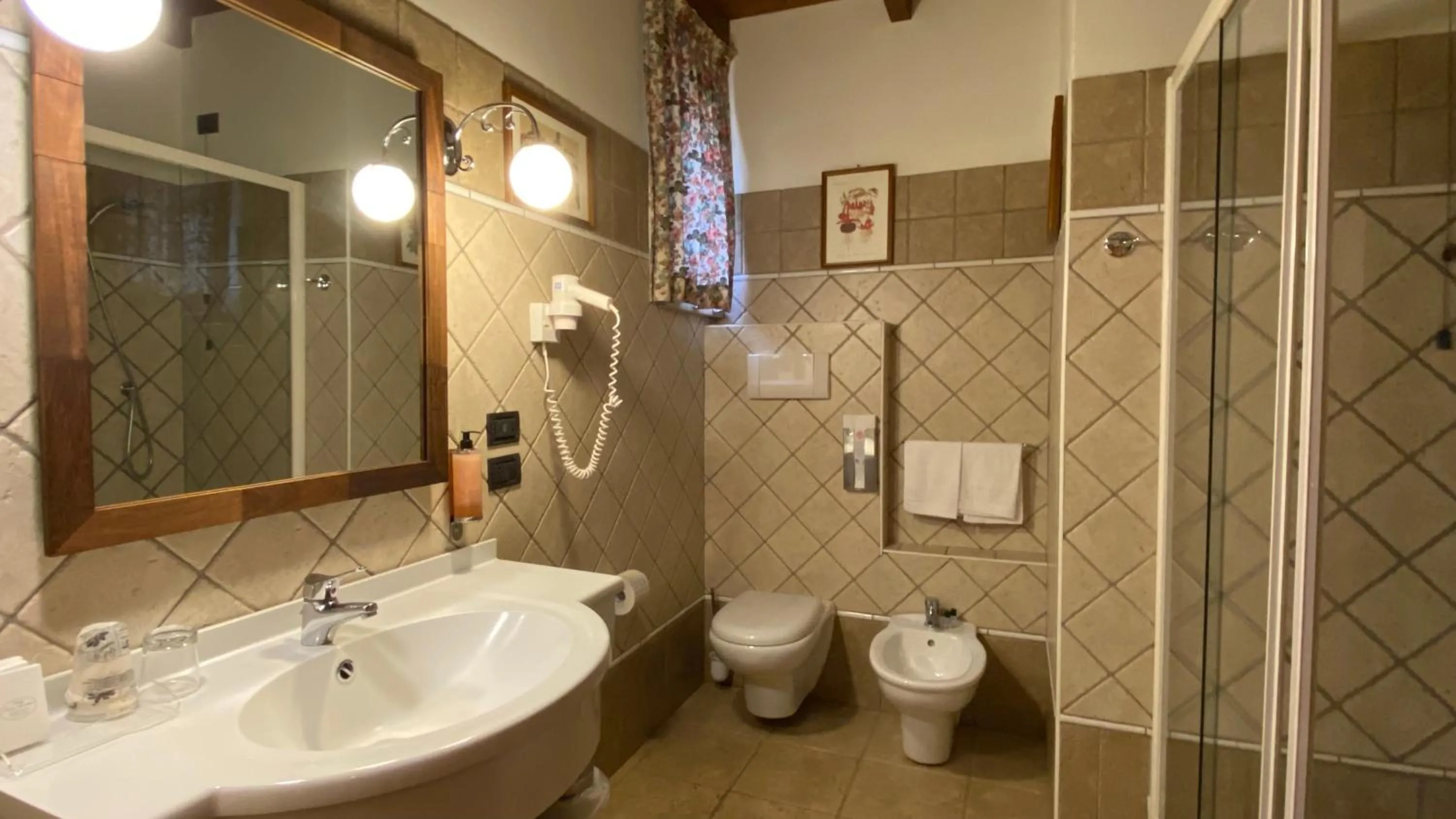 Bathroom in Relais Abbazia Santa Anastasia Resort & Winery