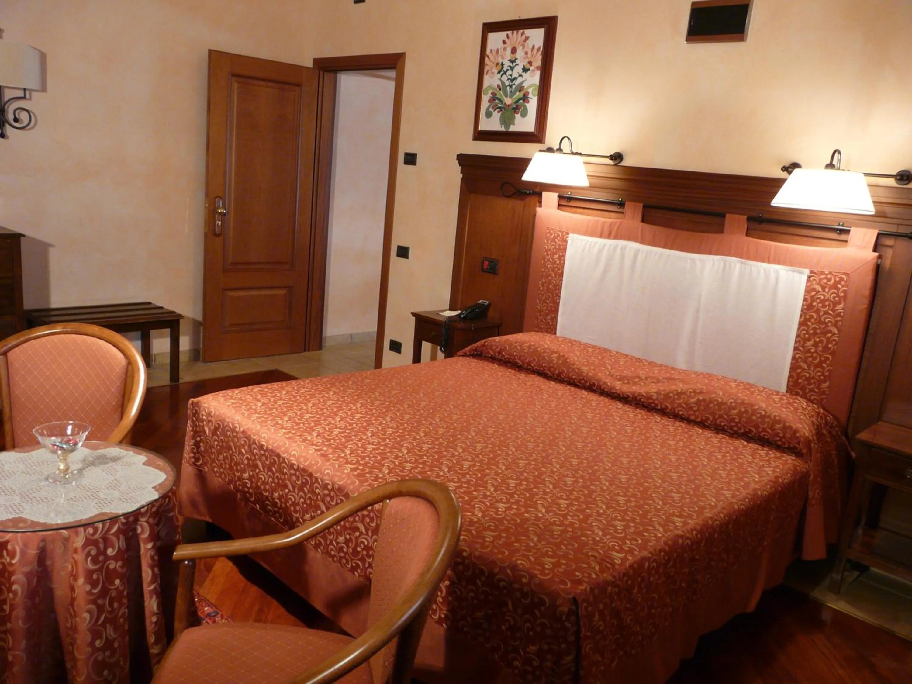 Bed in Relais Abbazia Santa Anastasia Resort & Winery