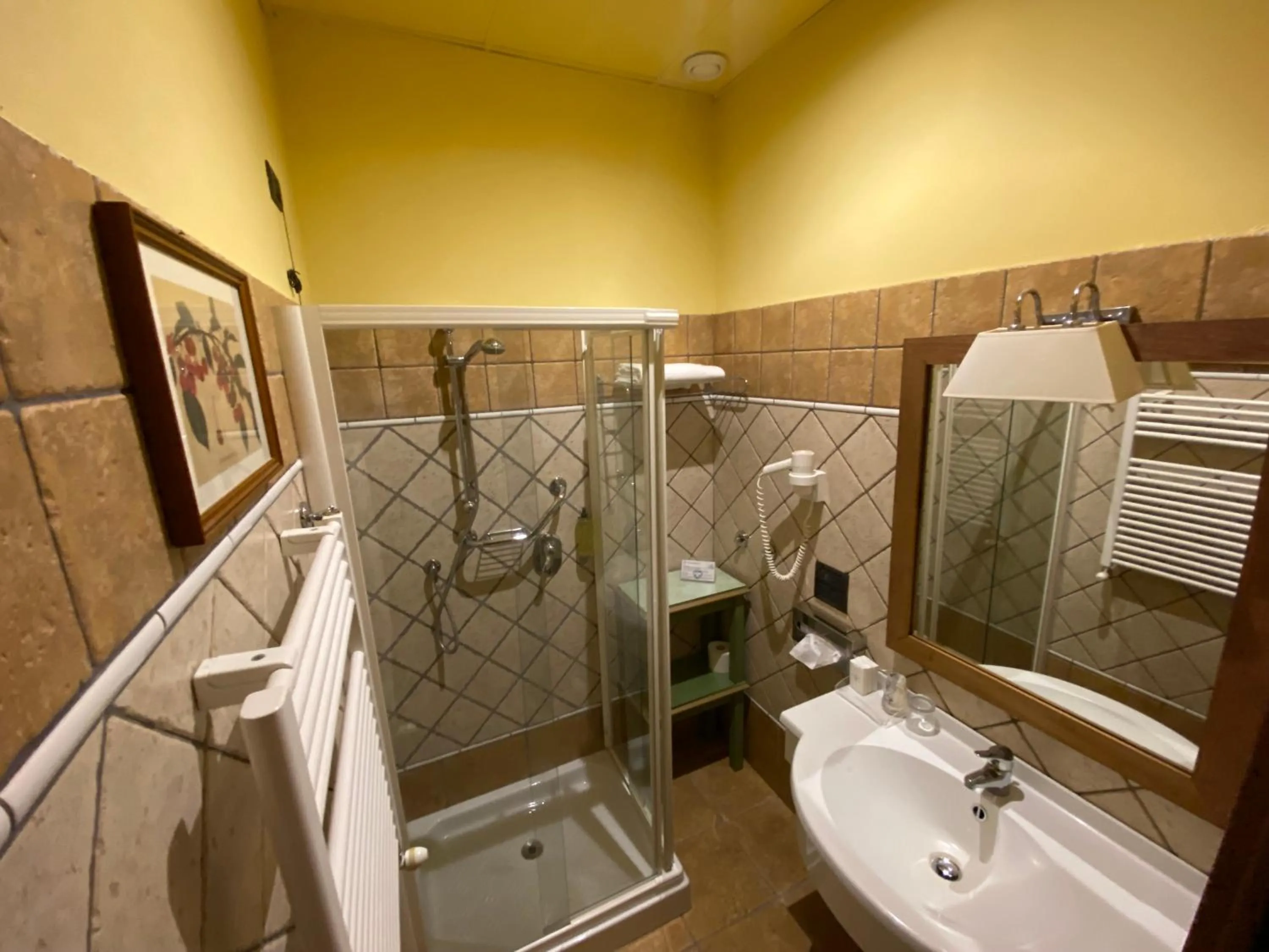 Shower in Relais Abbazia Santa Anastasia Resort & Winery