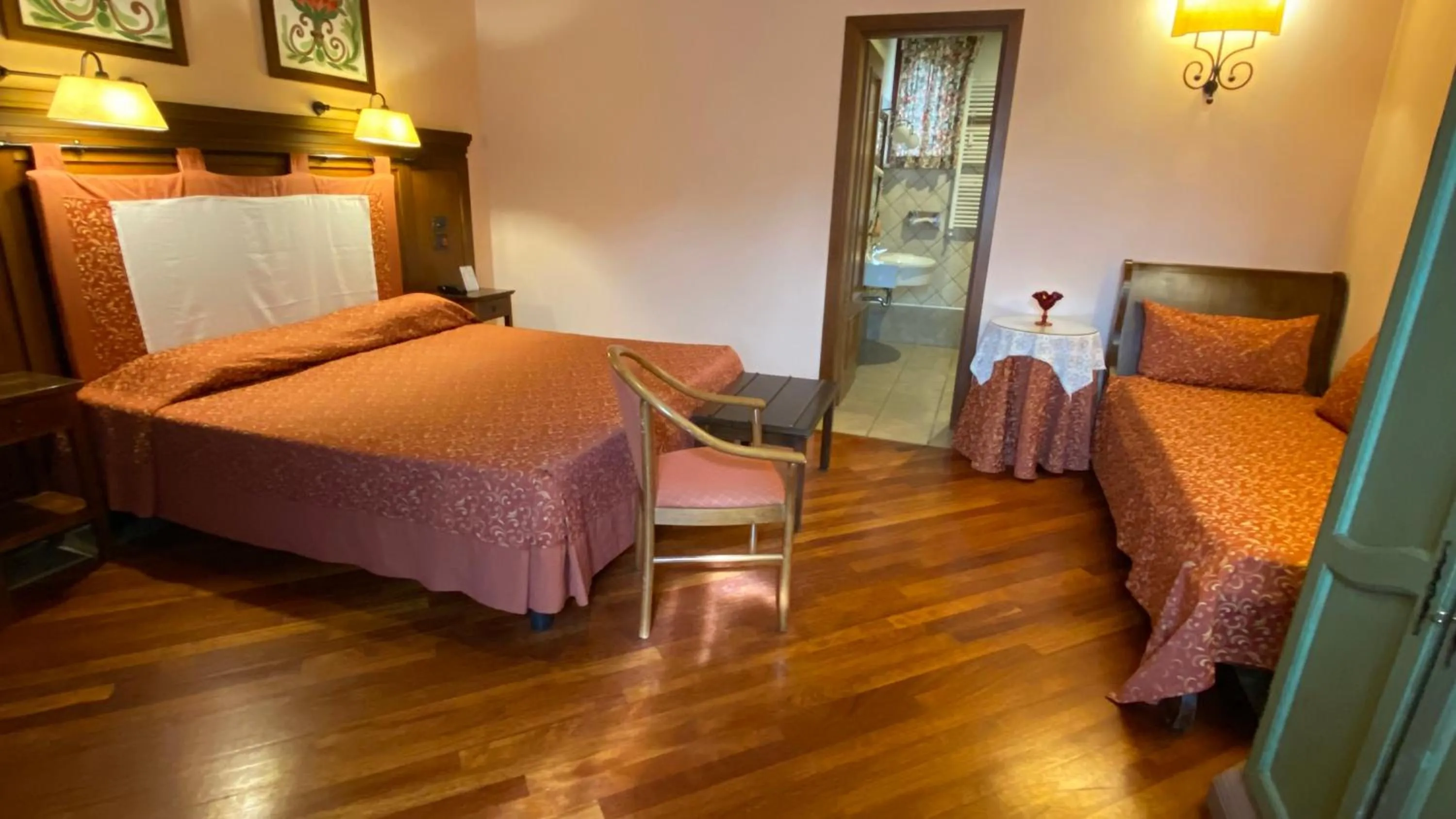 Photo of the whole room, Bed in Relais Abbazia Santa Anastasia Resort & Winery
