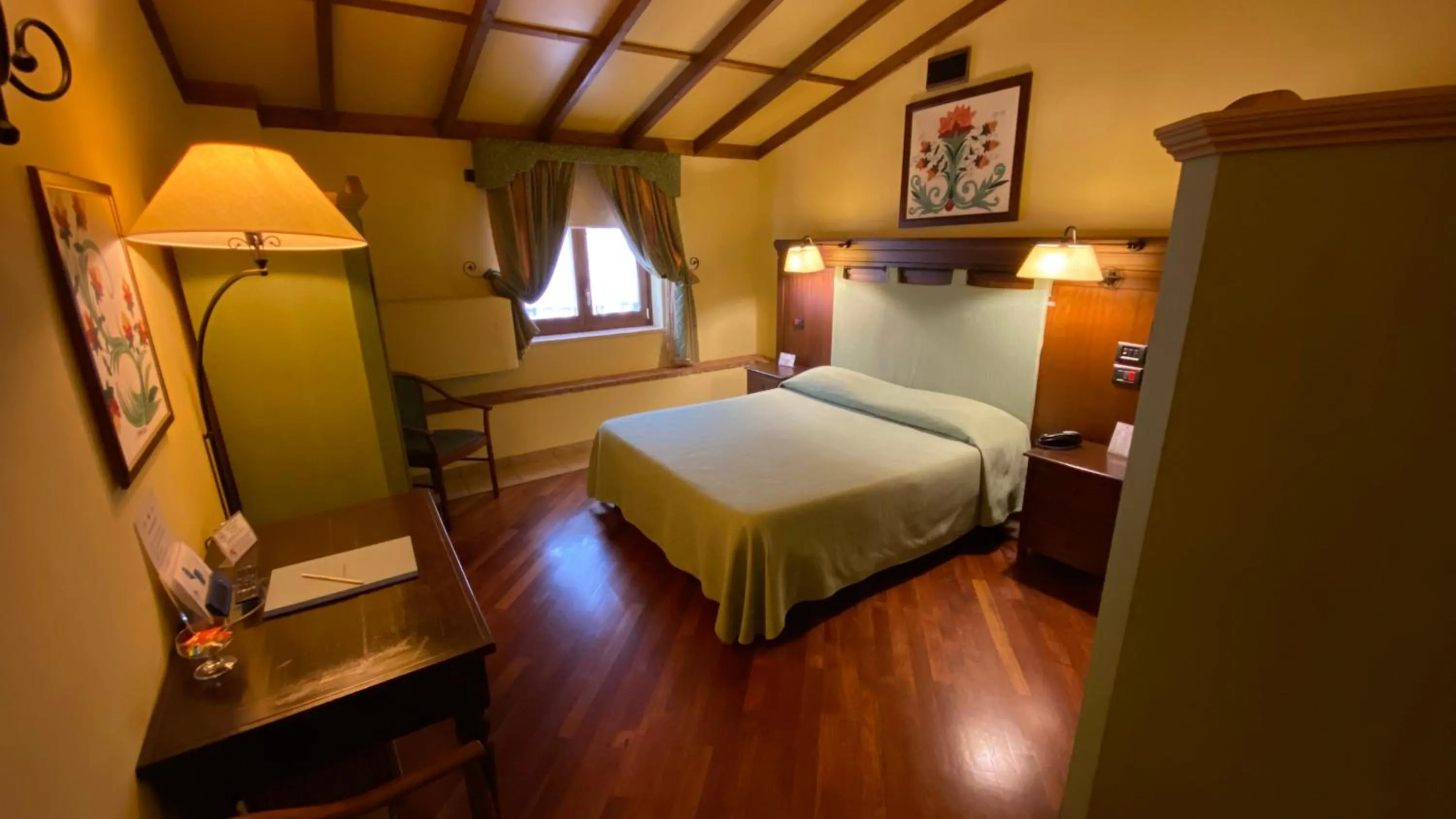 Photo of the whole room, Bed in Relais Abbazia Santa Anastasia Resort & Winery