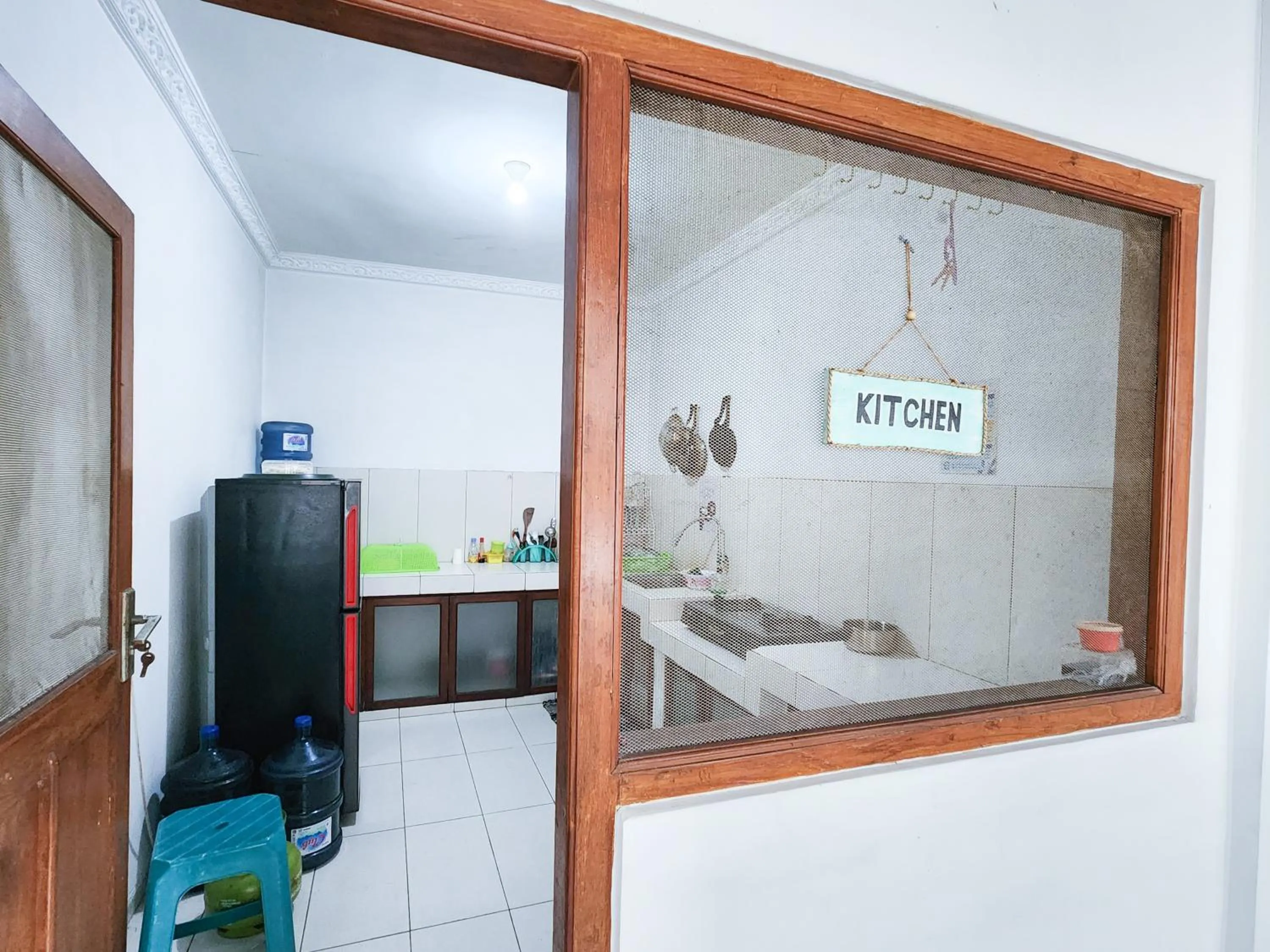 Bed in Homey Guesthouse Kertajaya (Syariah)