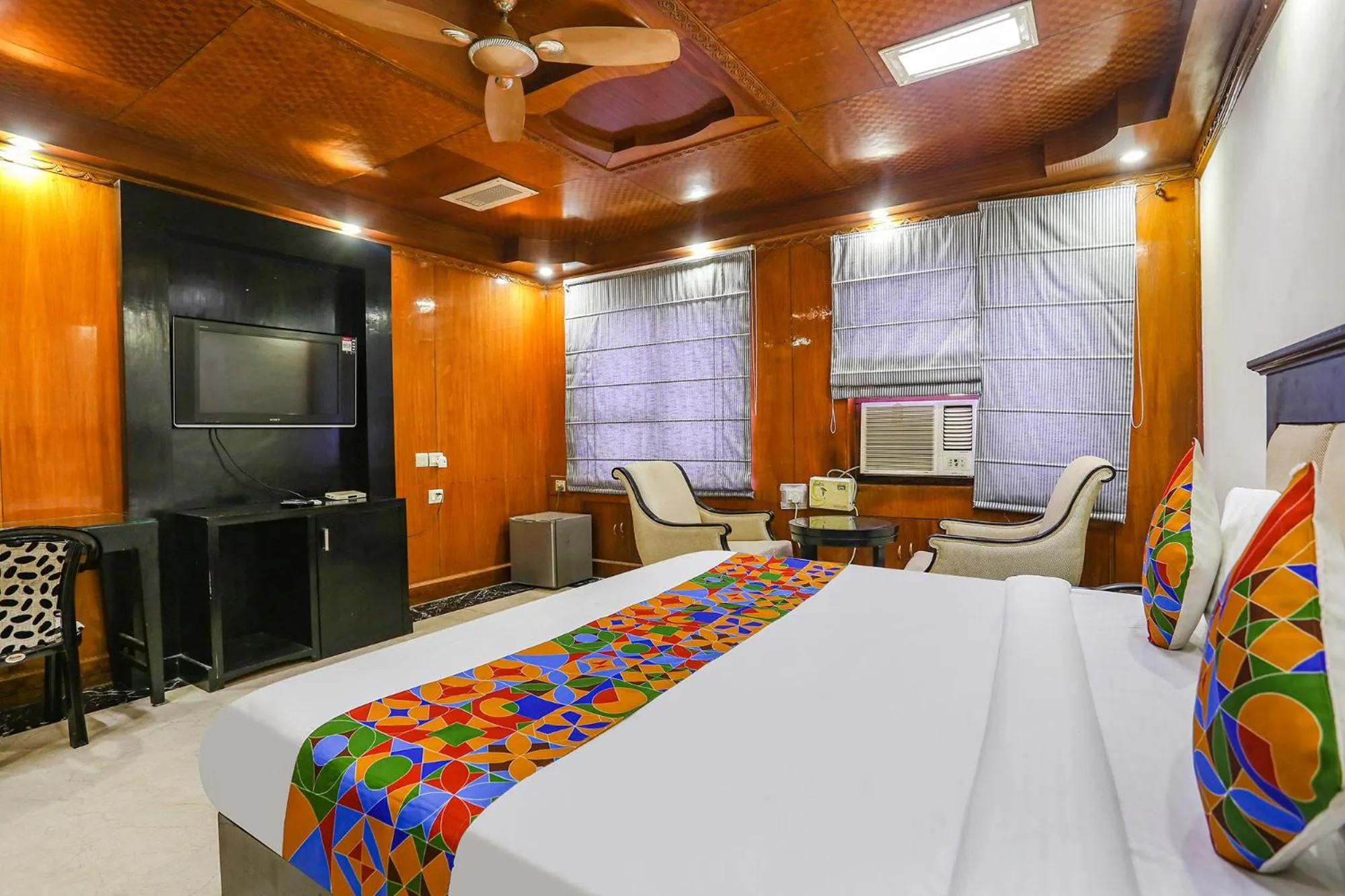 Bed in FabHotel Blue Moon Home Stay