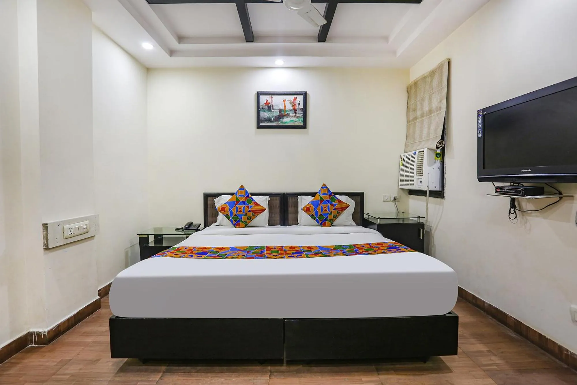 Bed in FabHotel Blue Moon Home Stay