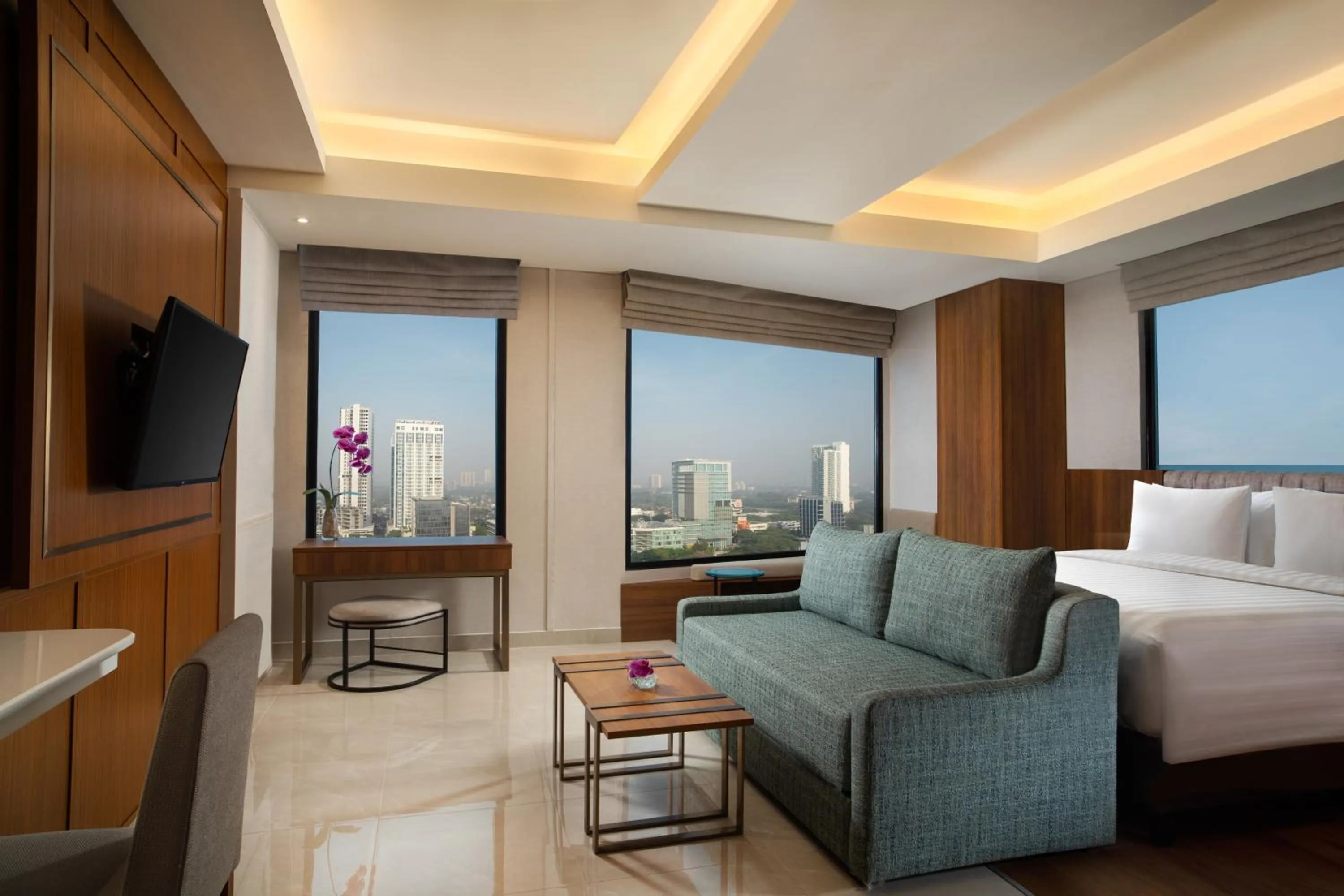 Seating area, Bed in Trembesi Hotel