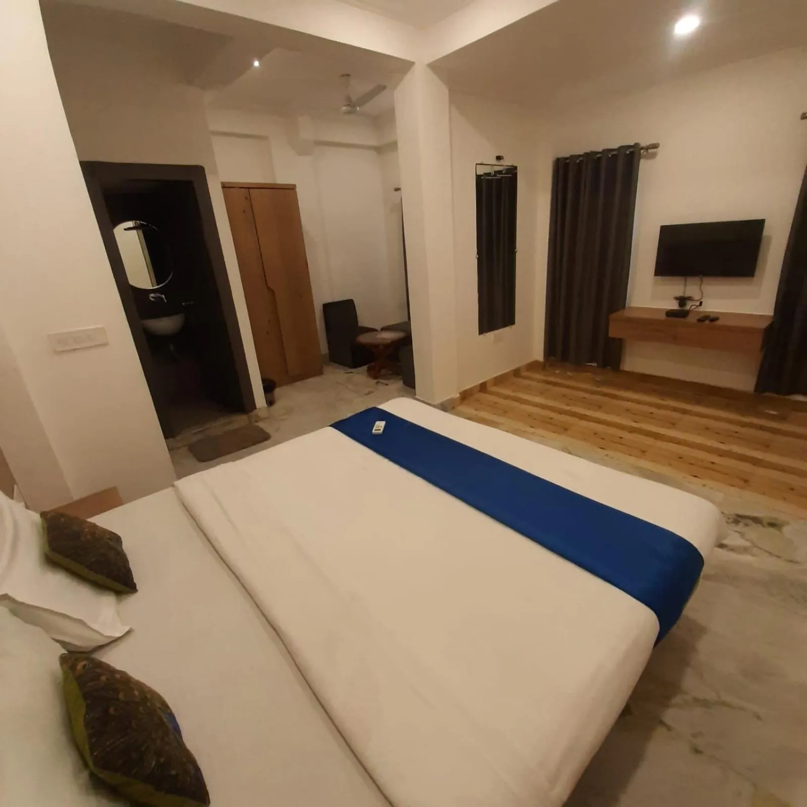 Photo of the whole room, Bed in Hotel Nisha Nest, Bhopal